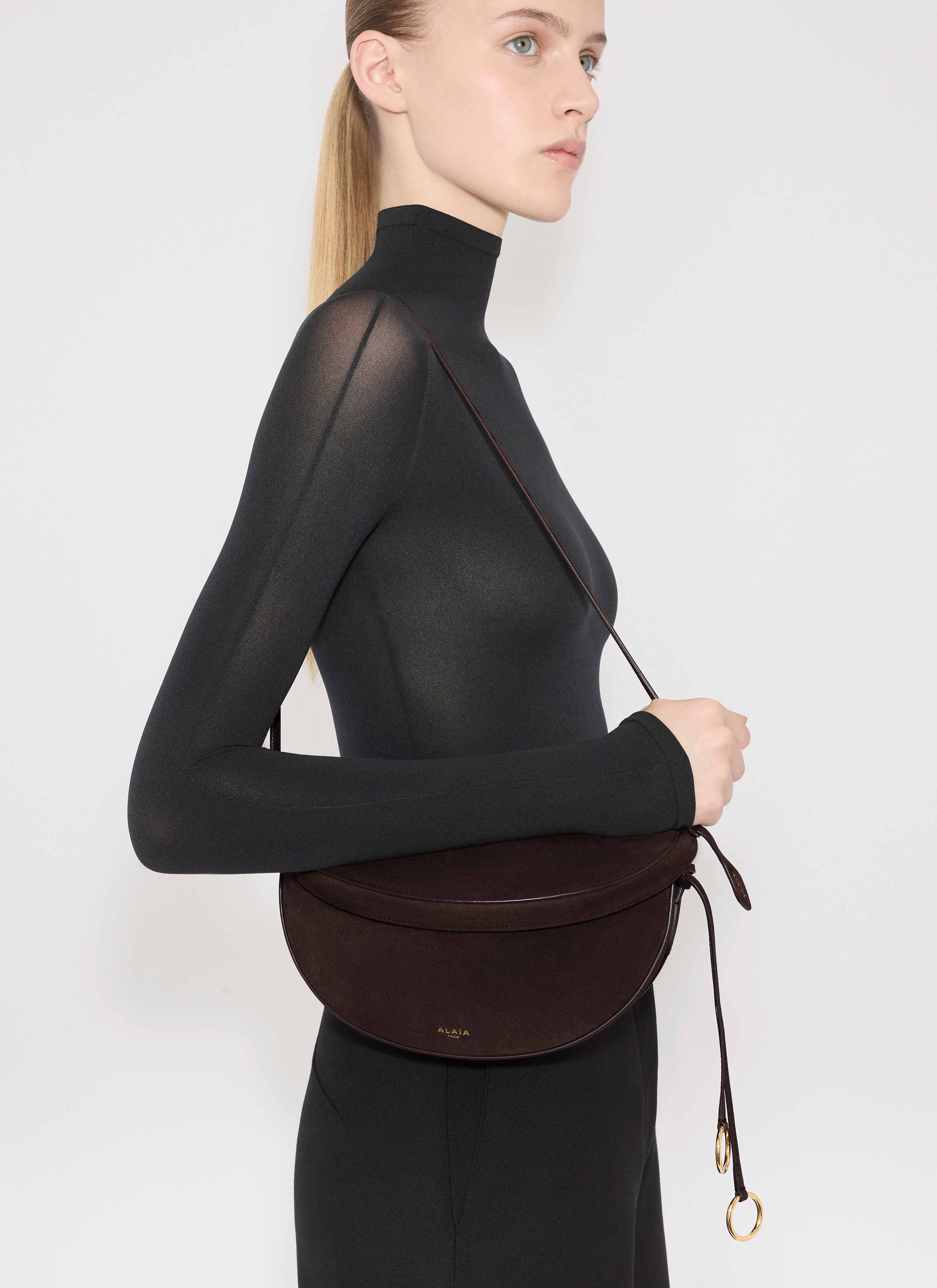 ALAÏA DARK BROWN HIP EAST WEST BAG IN NUBUCK