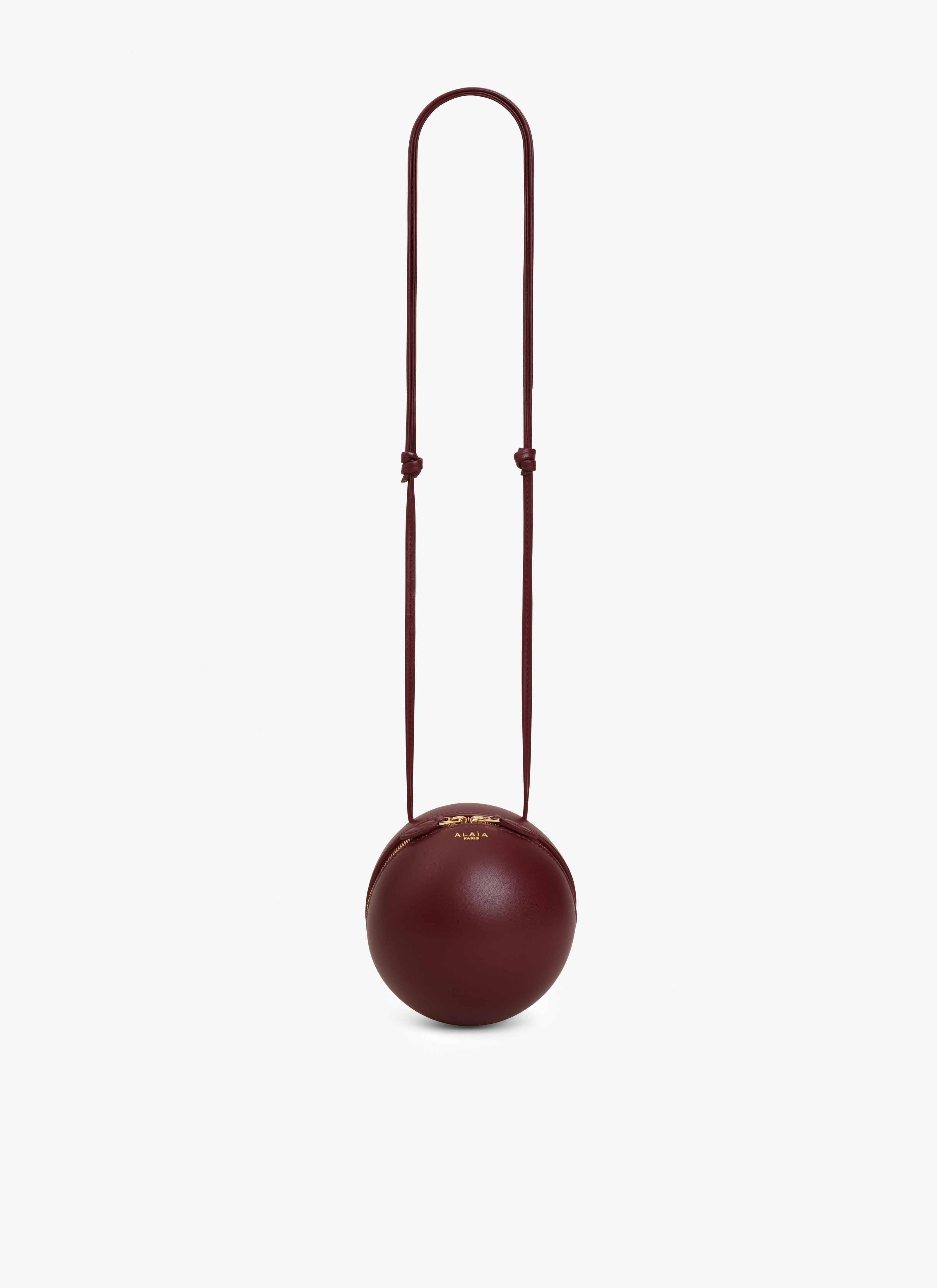 ALAÏA GARNET RED SPHERE BAG IN LAMBSKIN