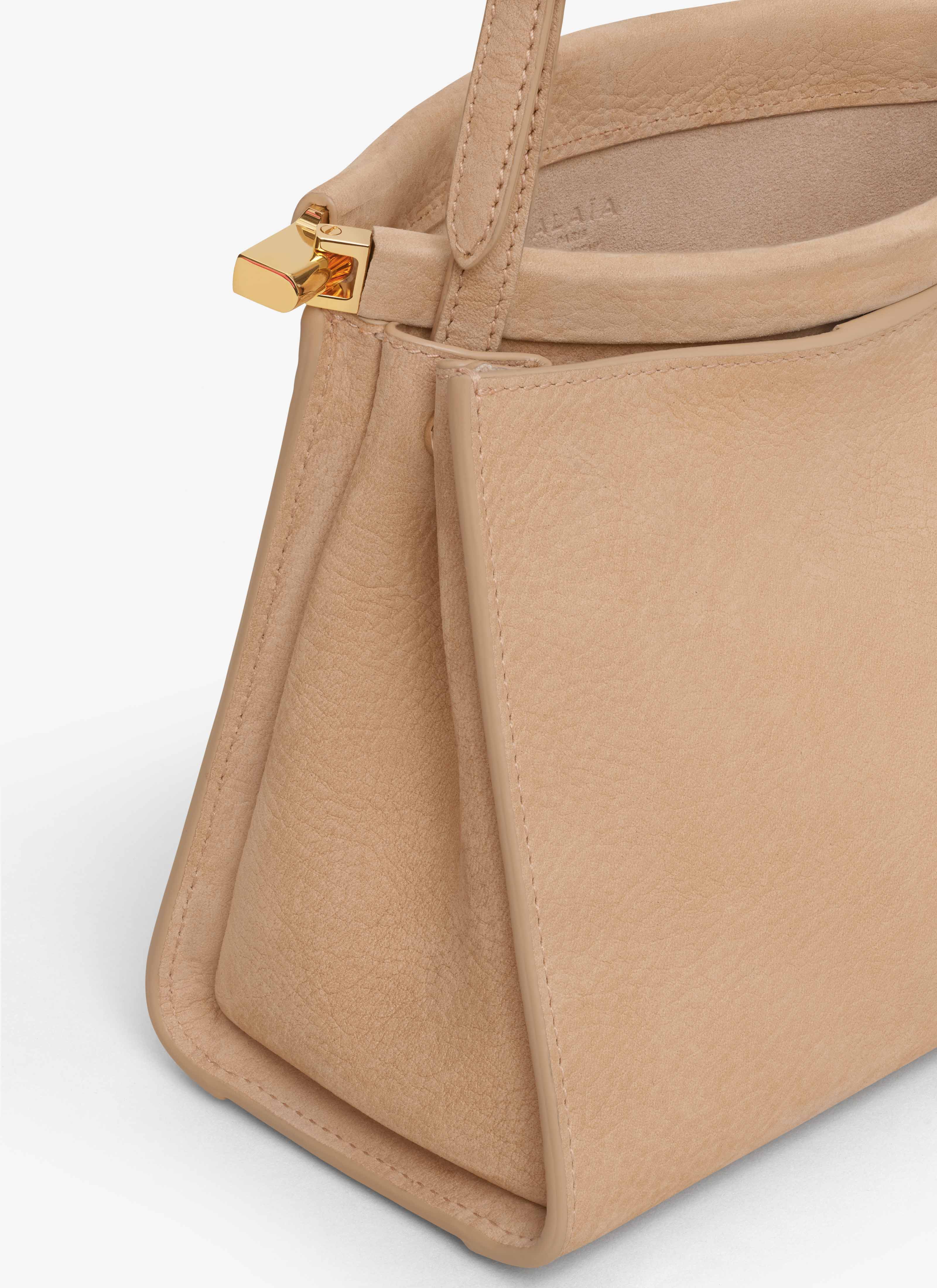 ALAÏA DESERT LE CLICK SMALL SQUARE BAG IN NUBUCK 