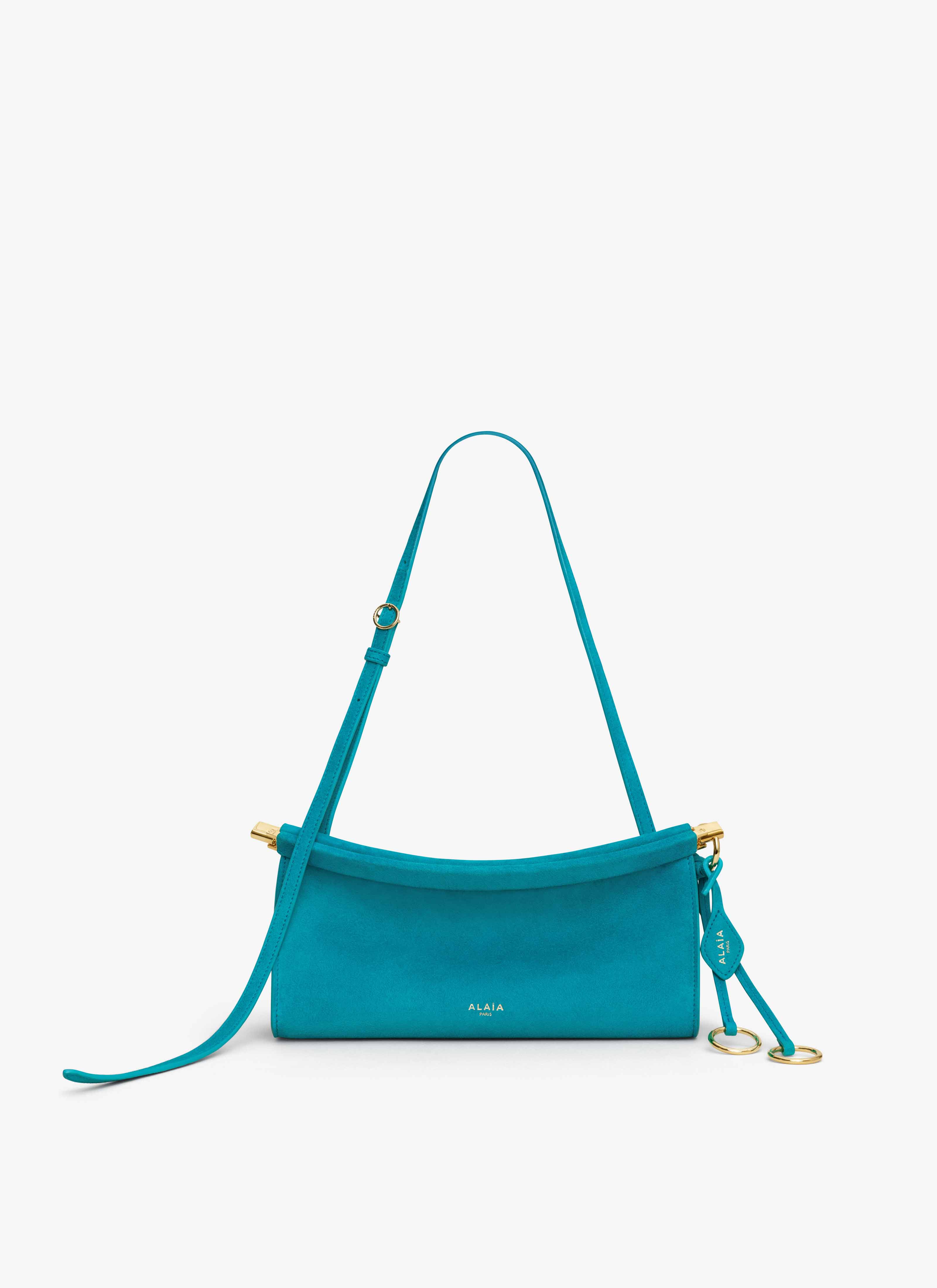 ALAÏA TURQUOISE LE CLICK EAST WEST SMALL BAG IN SUEDE