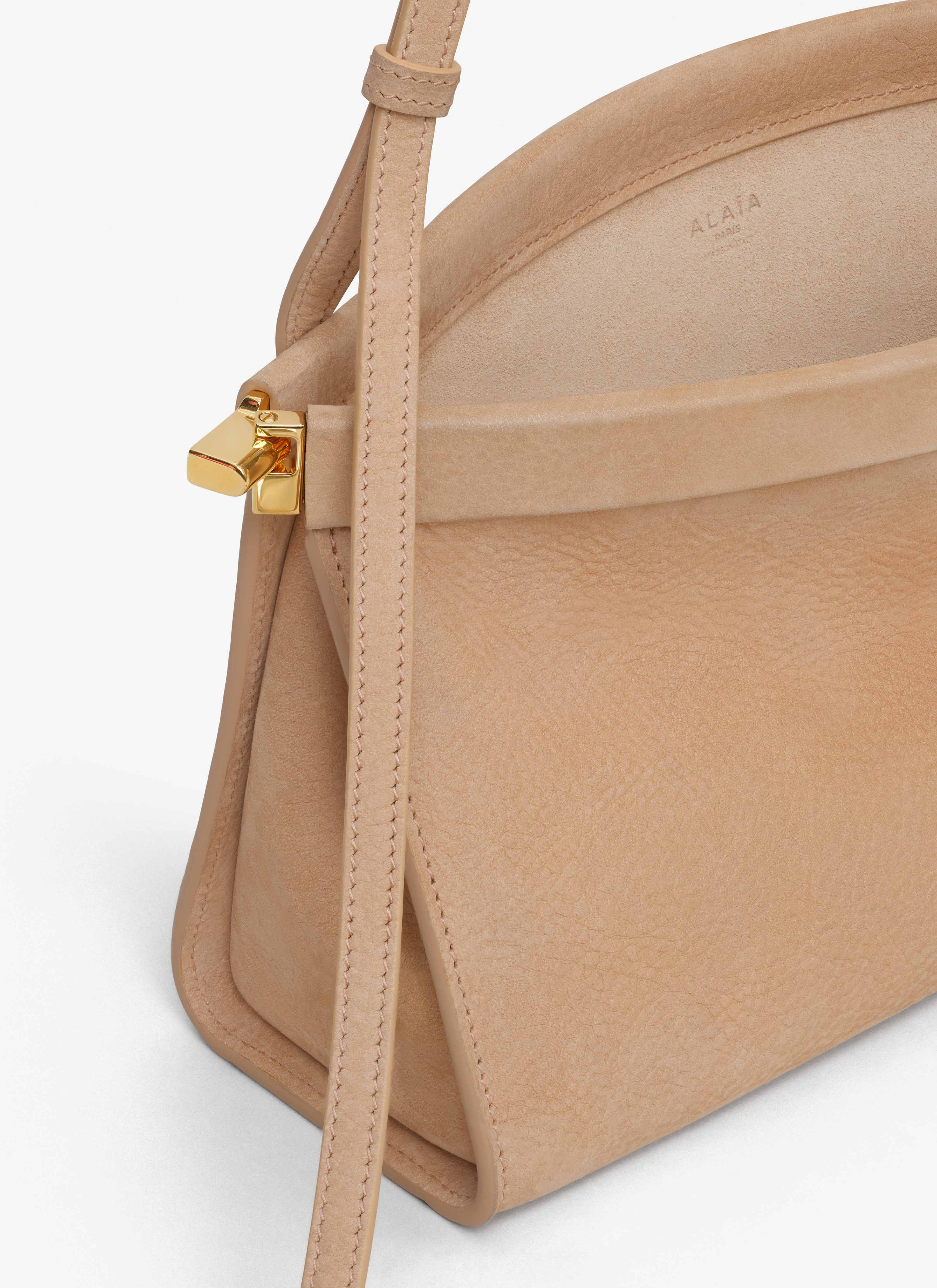 ALAÏA DESERT LE CLICK EAST WEST MEDIUM BAG IN NUBUCK