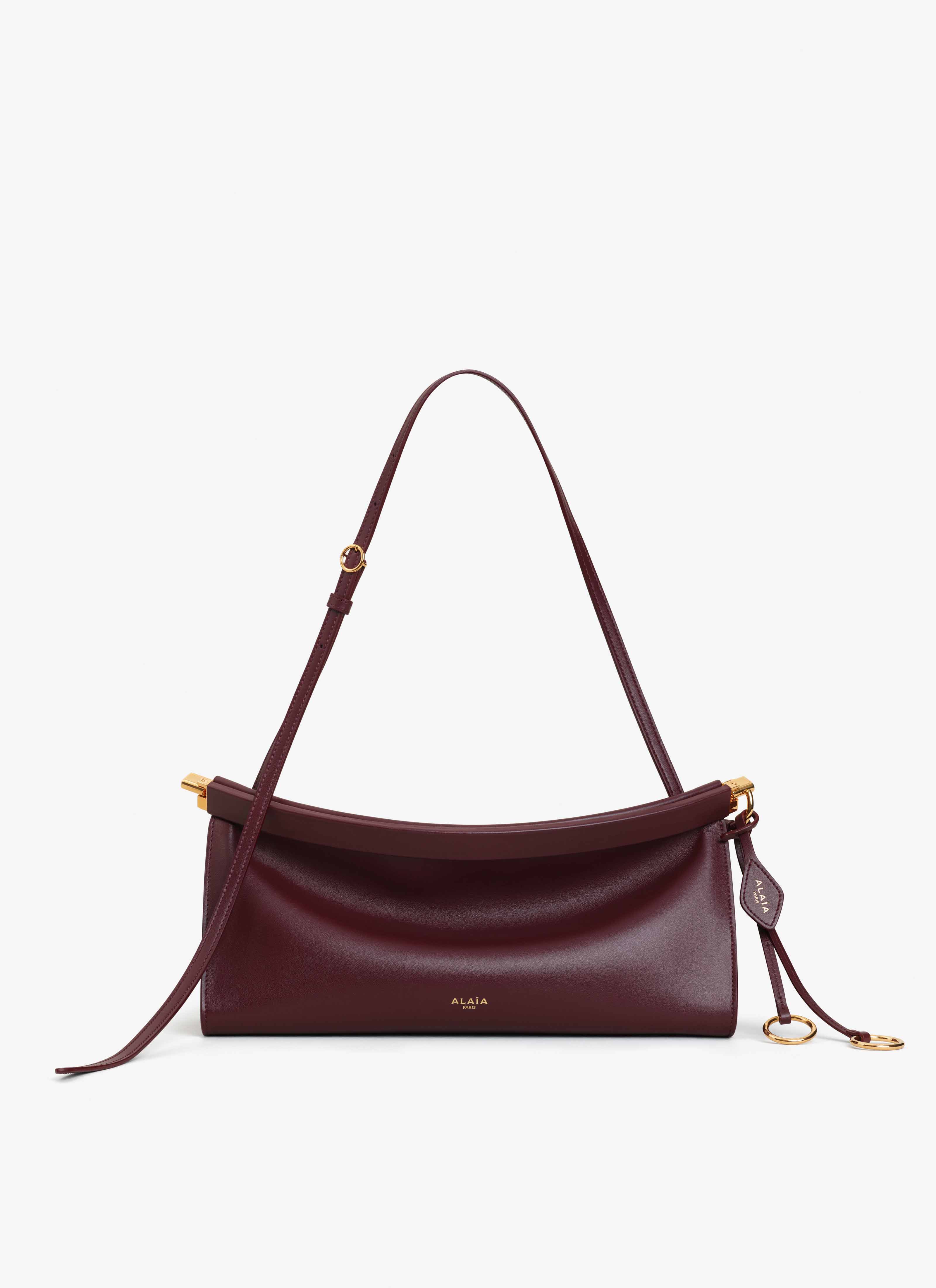 ALAÏA GARNET RED LE CLICK EAST WEST MEDIUM BAG IN LEATHER