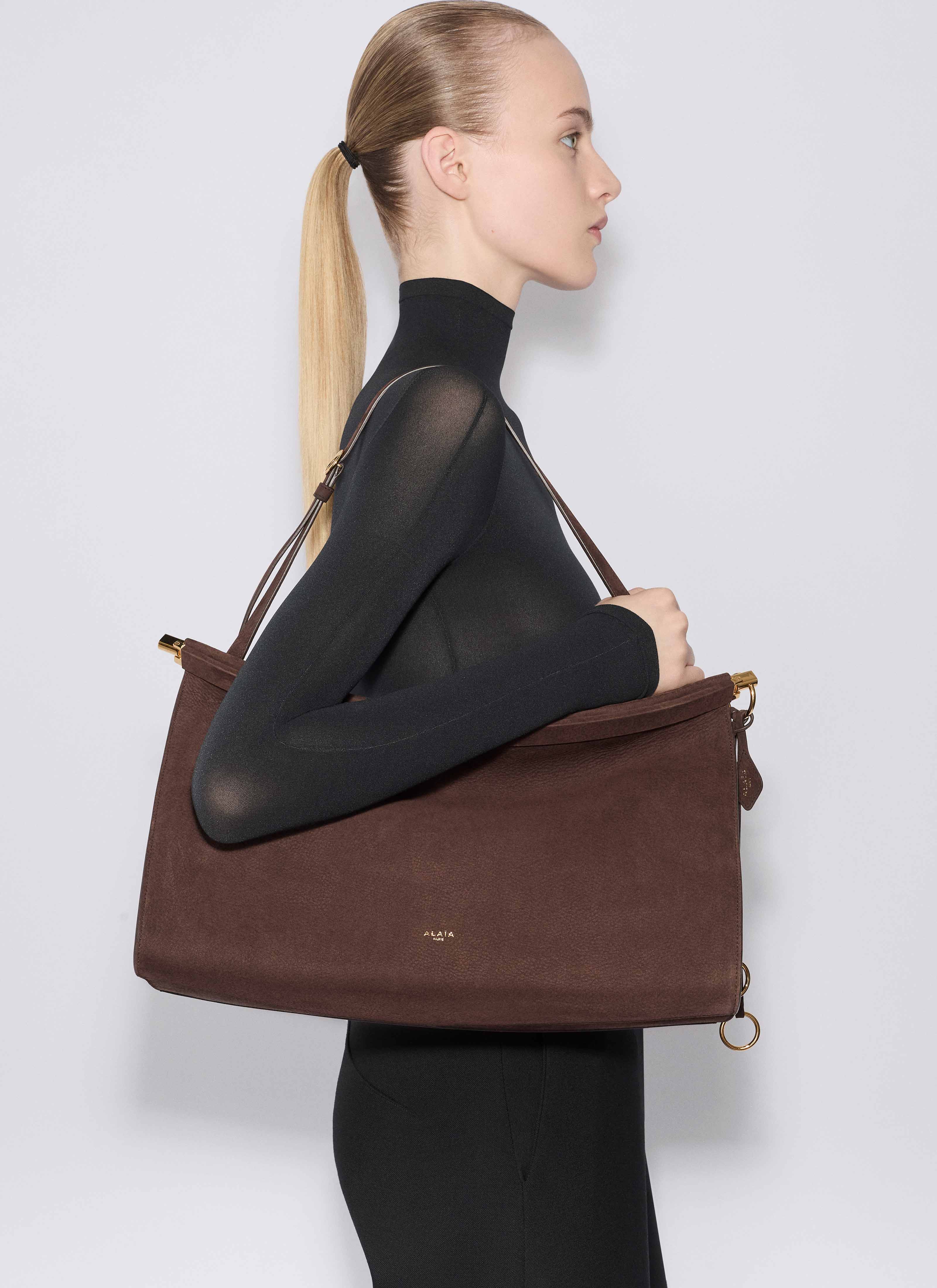 ALAÏA DARK BROWN LE CLICK EAST WEST LARGE BAG IN NUBUCK