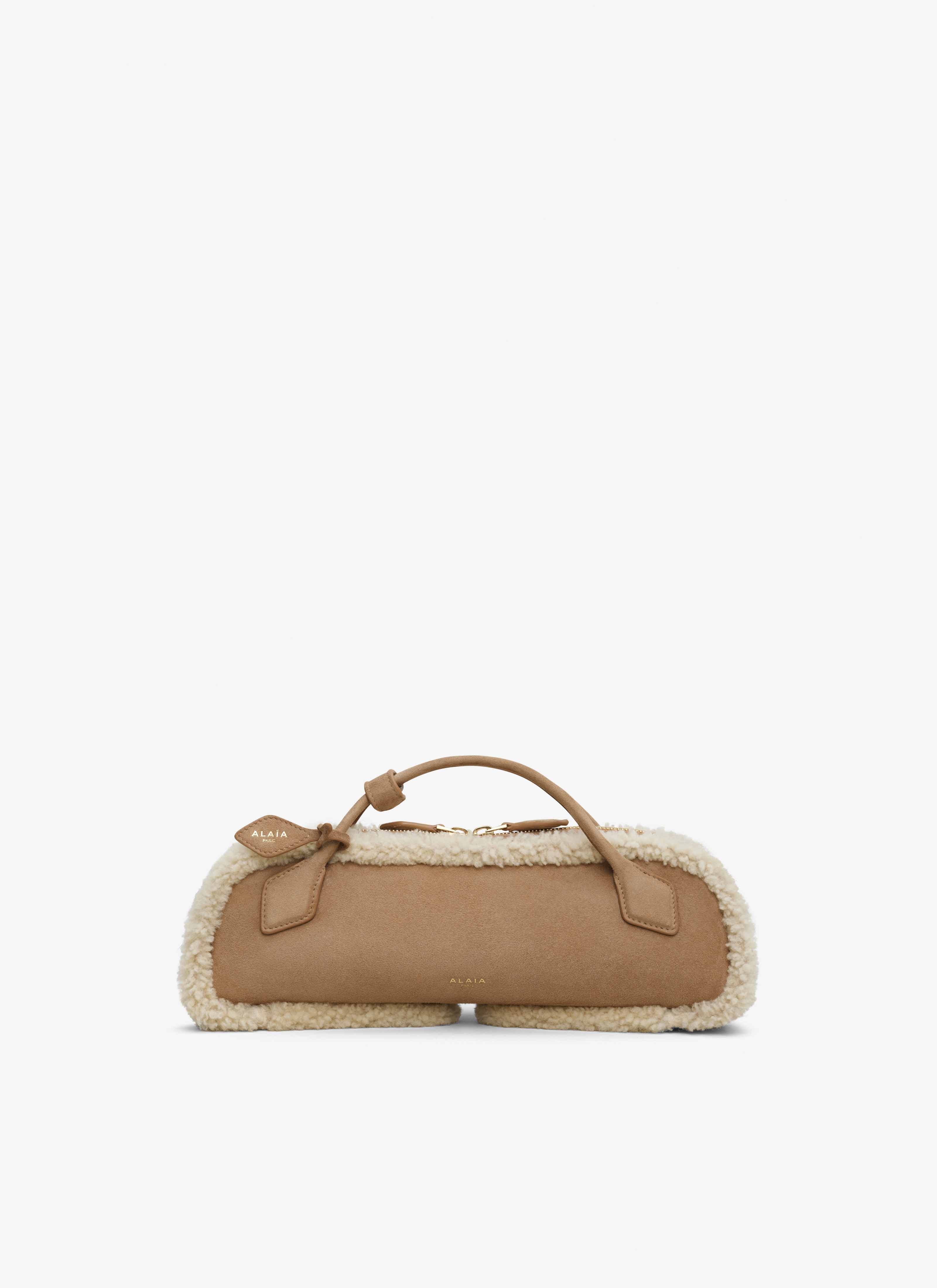 ALAÏA CAMEL LE TECKEL CLUTCH IN MERINO SHEARLING