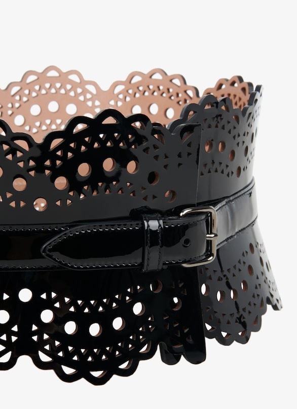 CINTURÓN BUSTIER DE PIEL DE BECERRO CON MOTIVOS VIENNE Y OLA ALAÏA NEGRO CINTURÓN BUSTIER DE PIEL DE BECERRO CON MOTIVOS VIENNE Y OLA