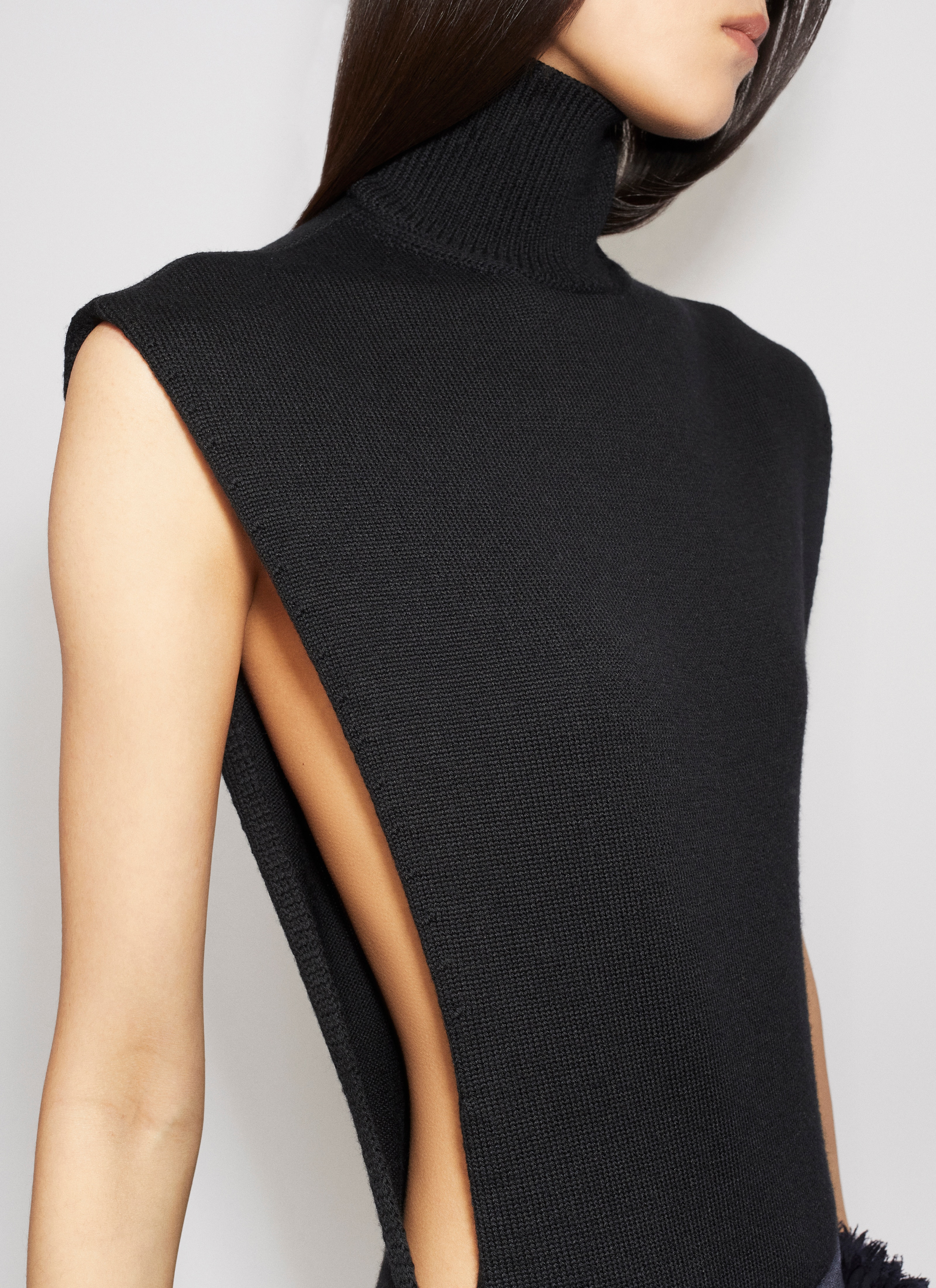 ALAÏA SCHWARZ STRICKBODY MIT FLÜGELÄRMELN