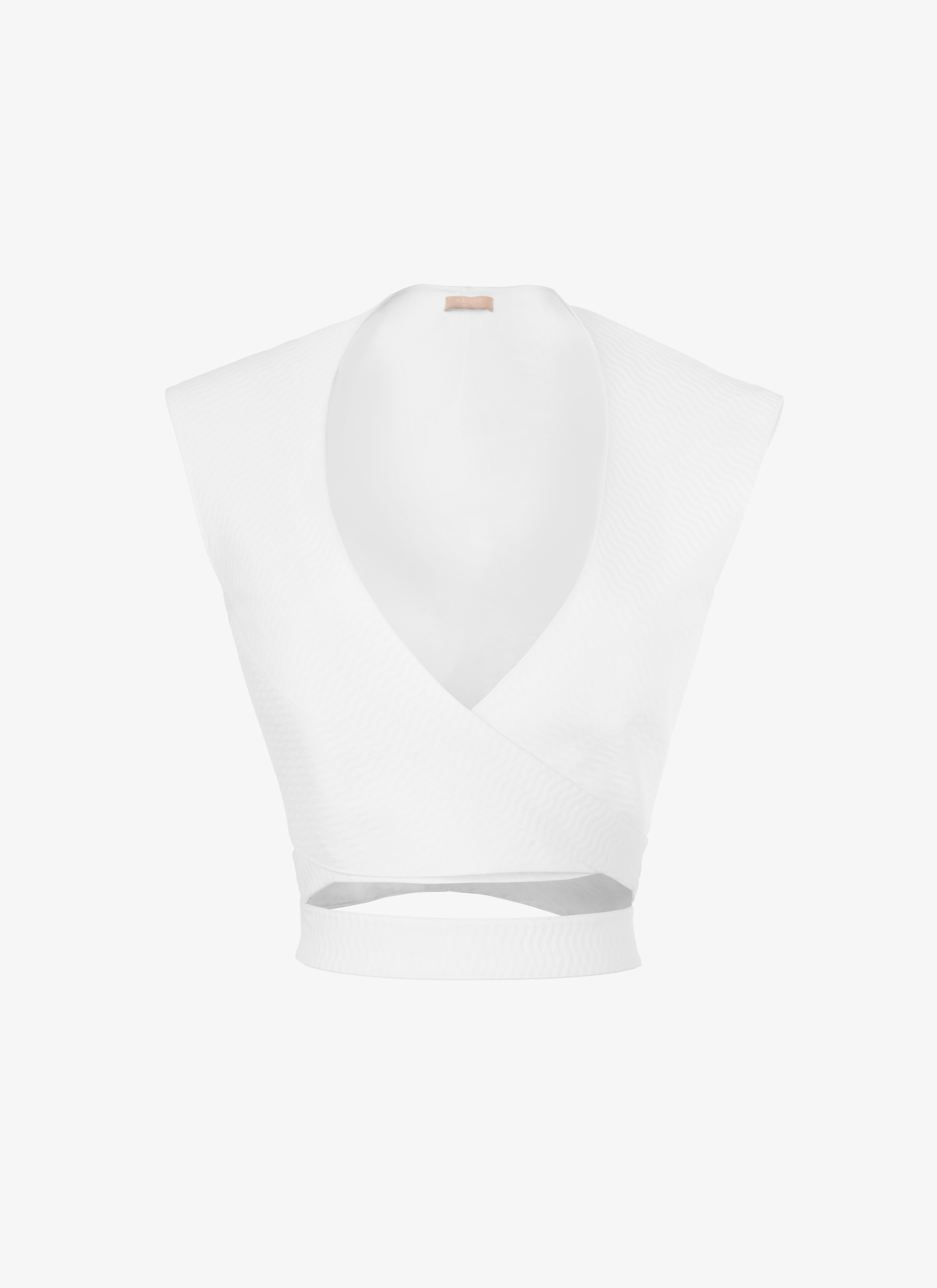 ALAÏA WHITE WRAP-EFFECT BELTED COTTON TOP