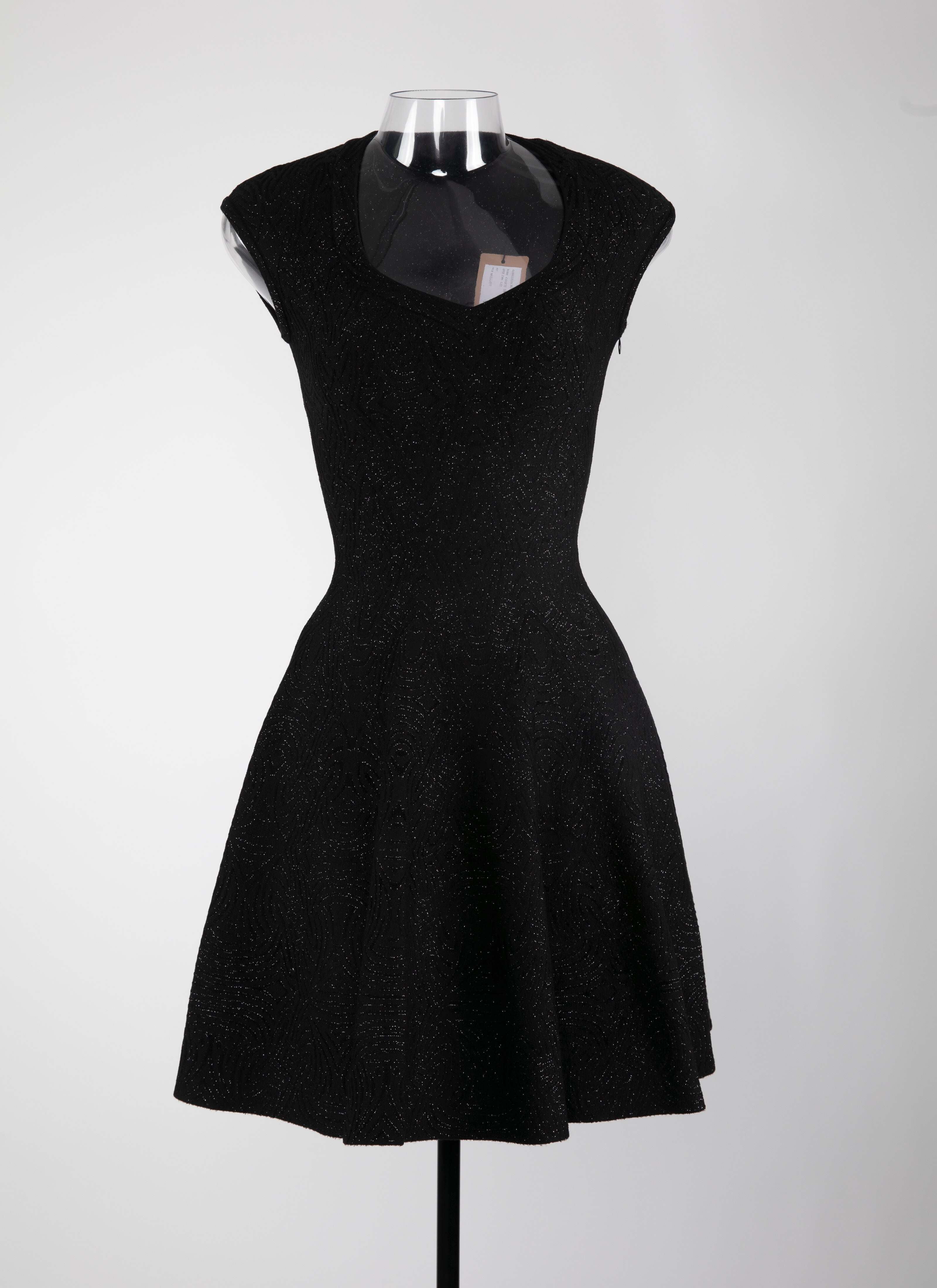 ALAÏA SHINY BLACK DRESSES