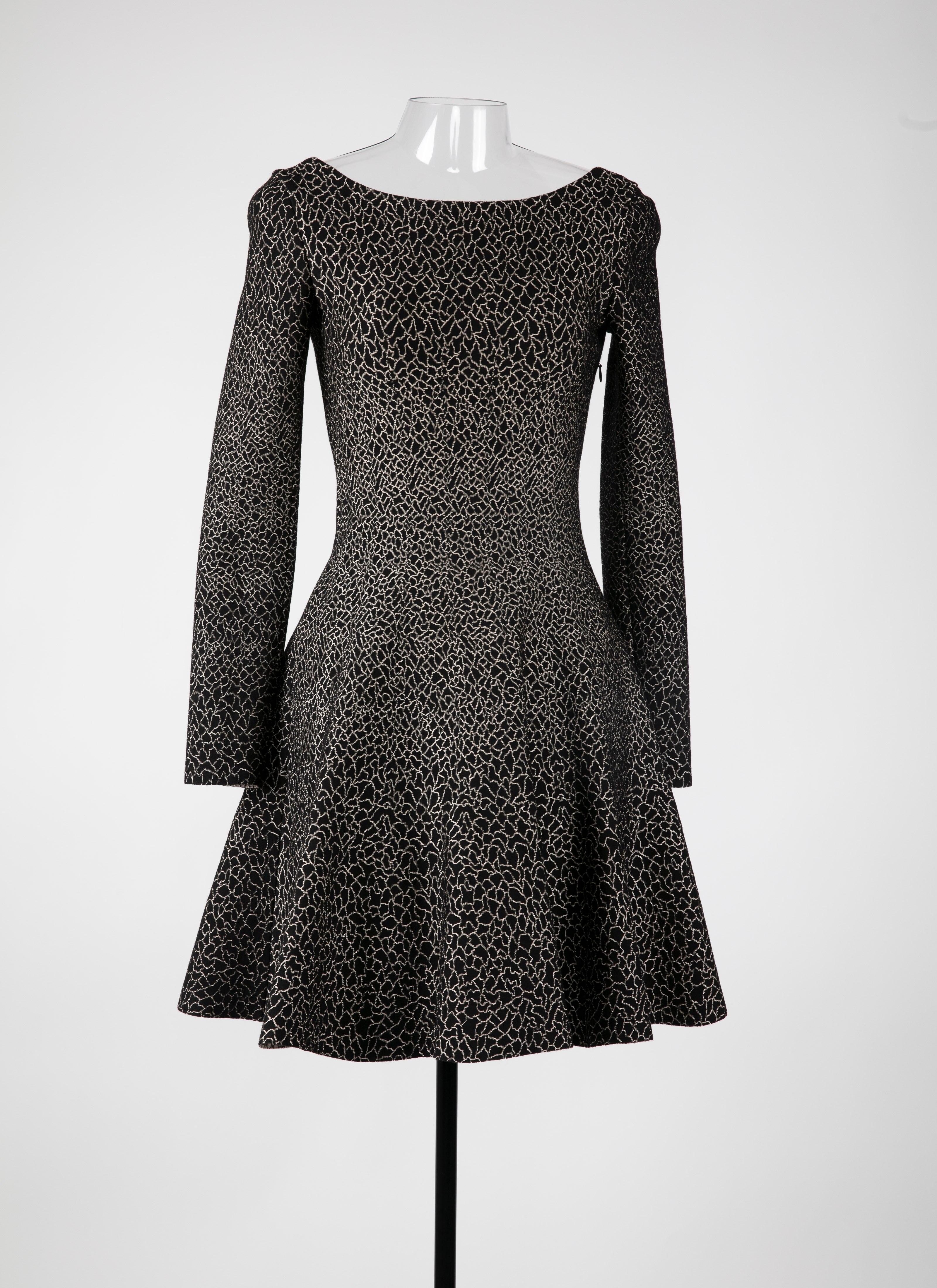 ALAÏA BLACK/GOLD DRESSES