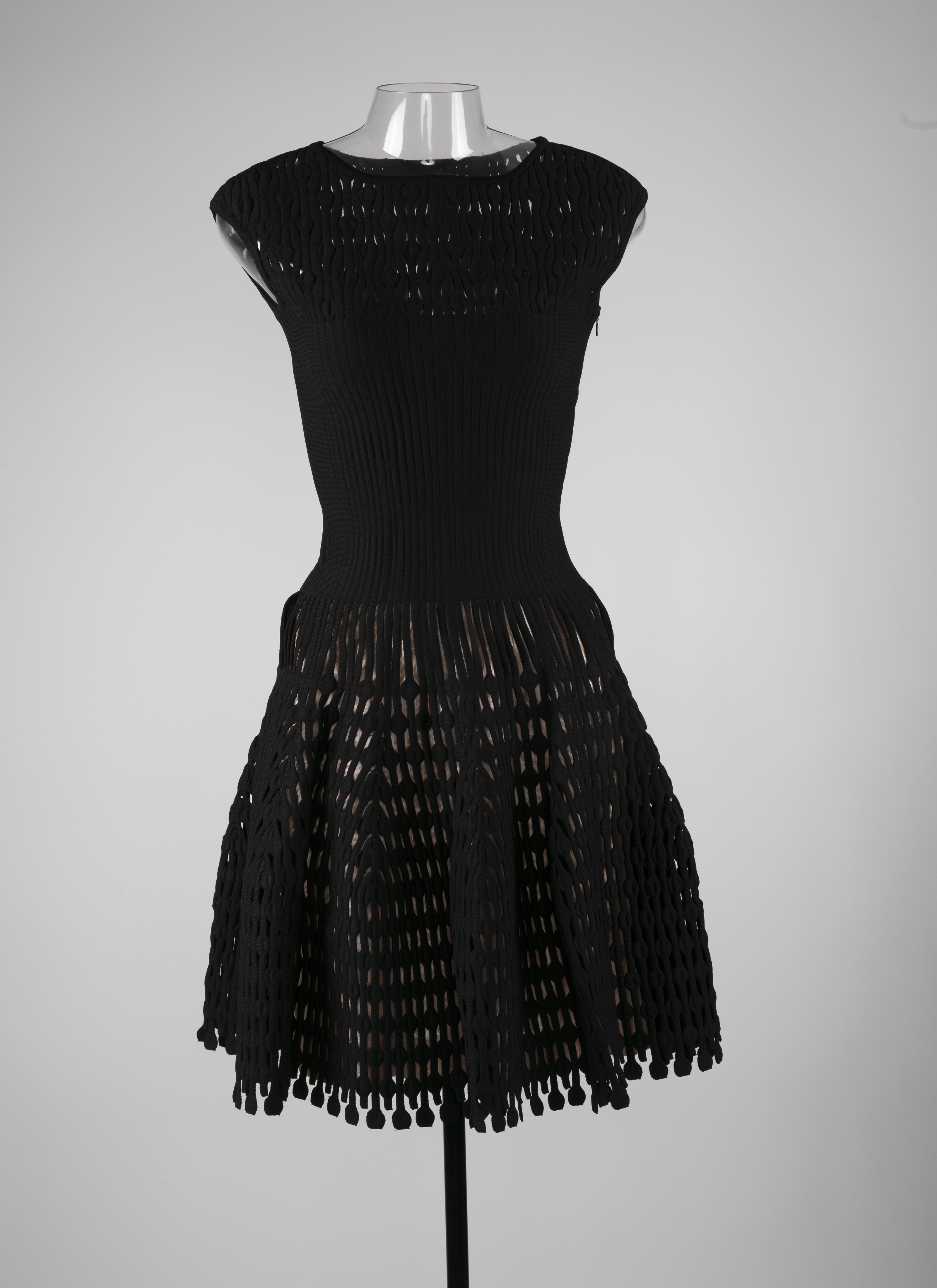 ALAÏA BLACK DRESSES