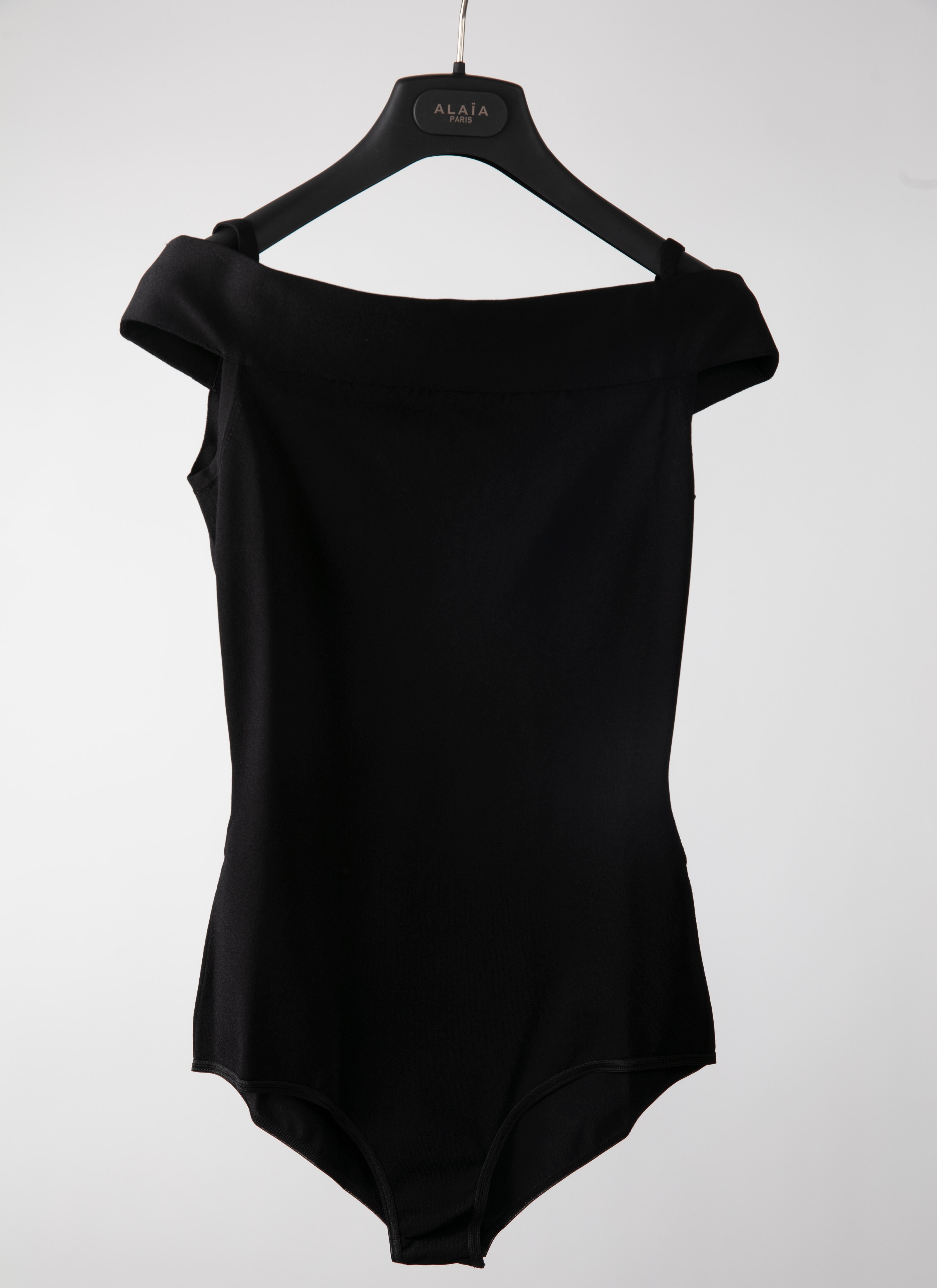 ALAÏA  OFF-THE-SHOULDER NECKLINE BODYSUIT
