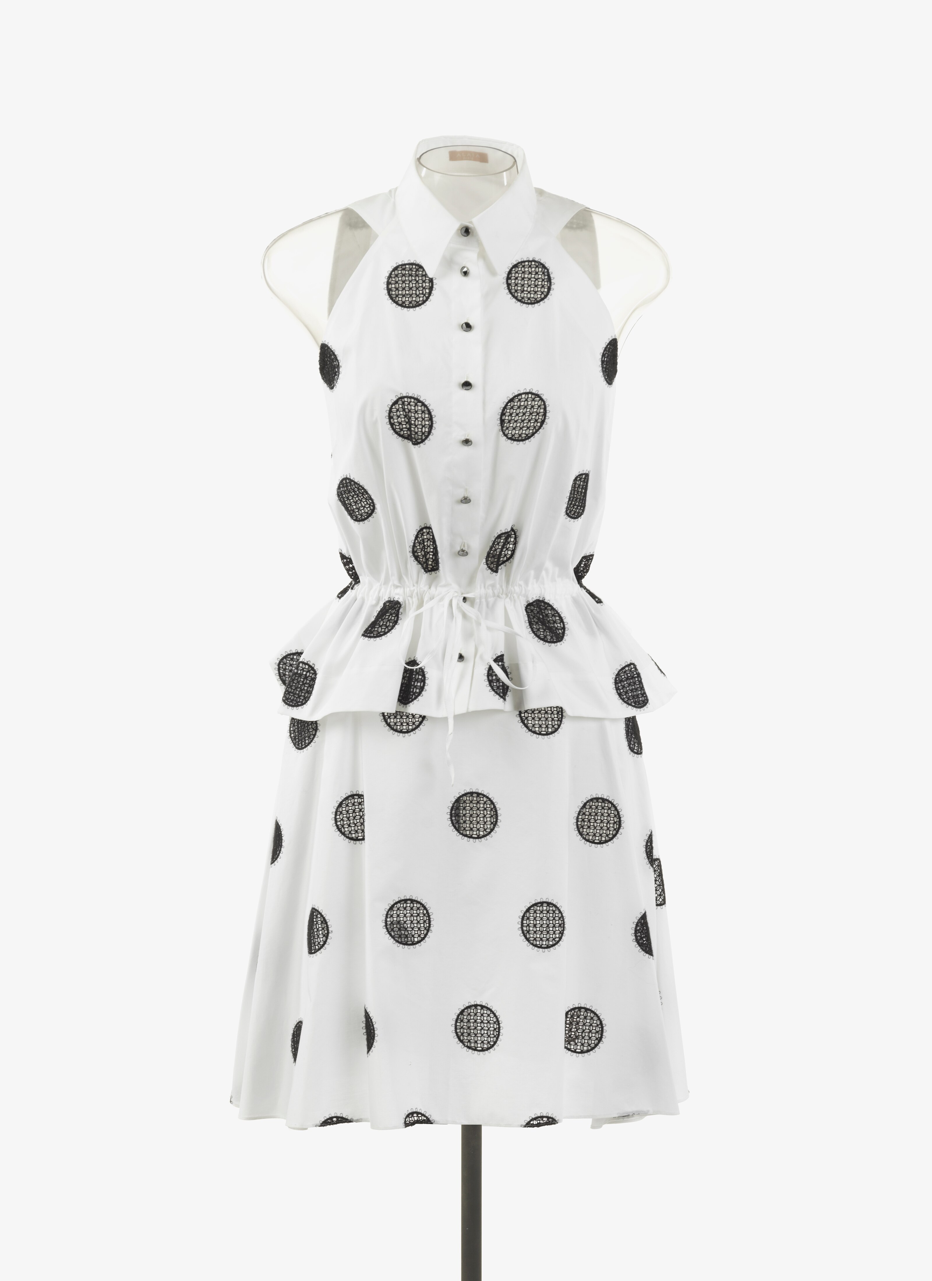 ALAÏA  SHORT POPLIN SKIRT WITH LARGE POLKA DOTS 
