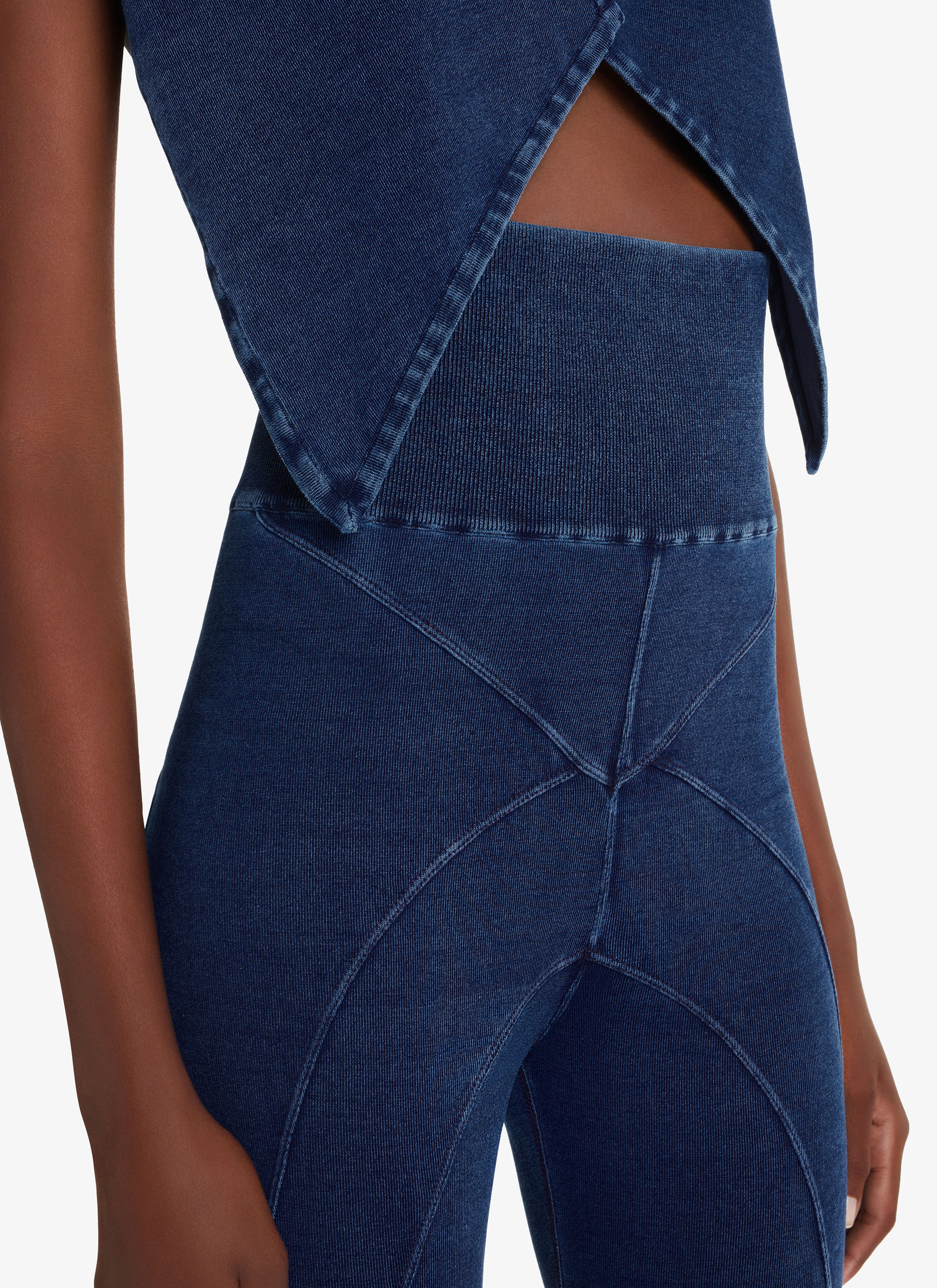 ALAÏA BLUE JEANS KNITTED DENIM LEGGINGS