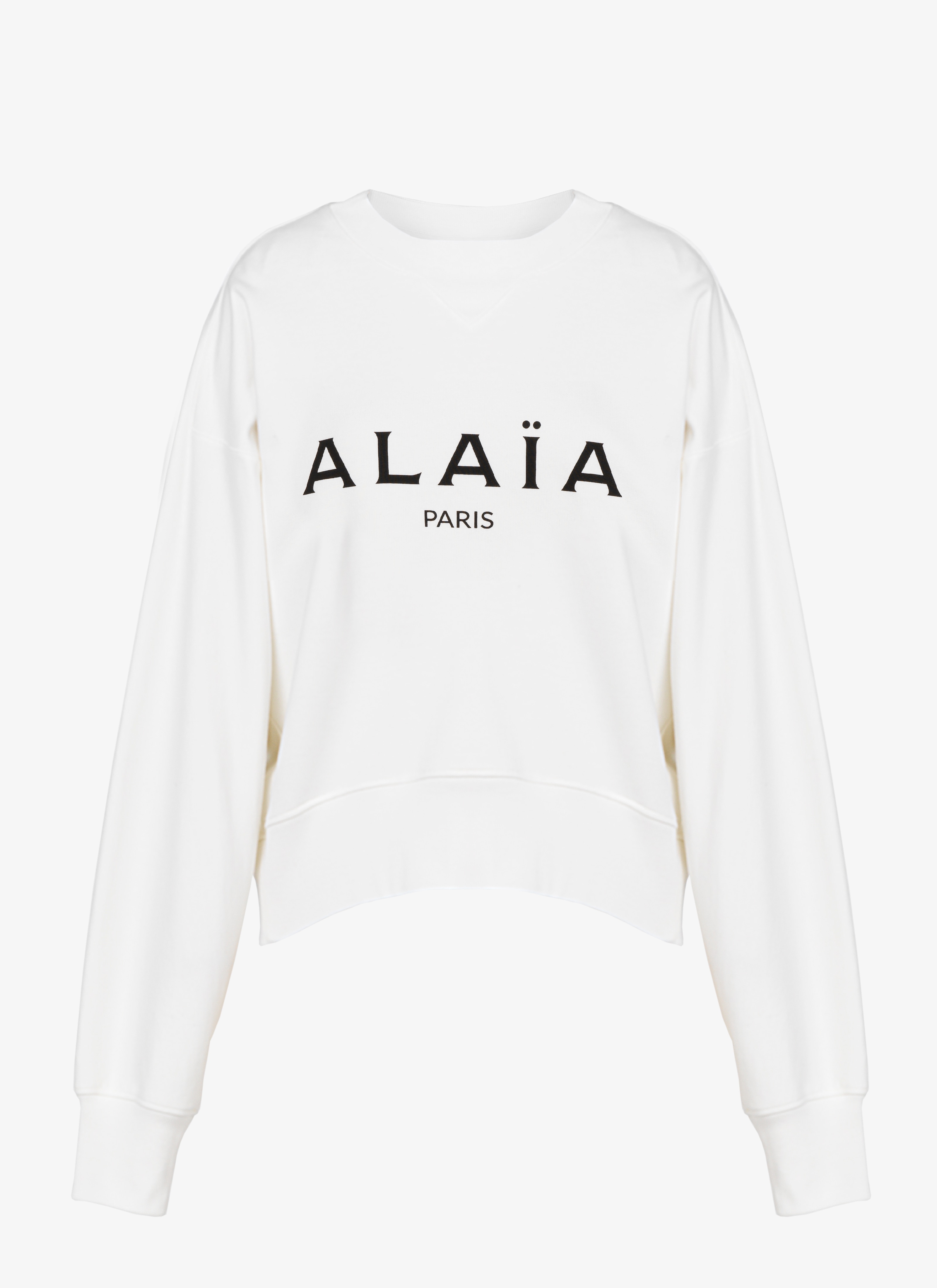 white boxy sweater