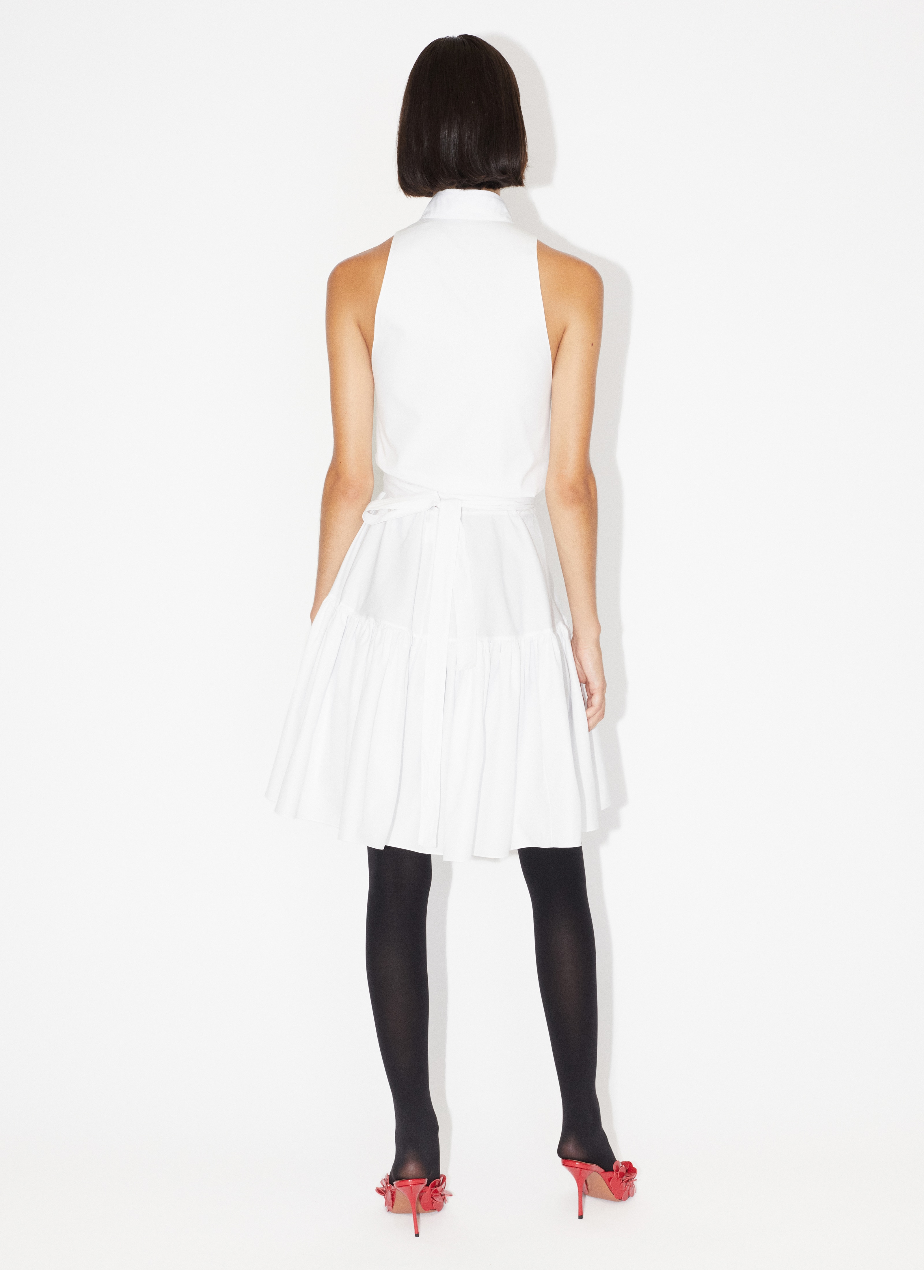 ALAÏA ABITO CON BOTTONI BIANCO