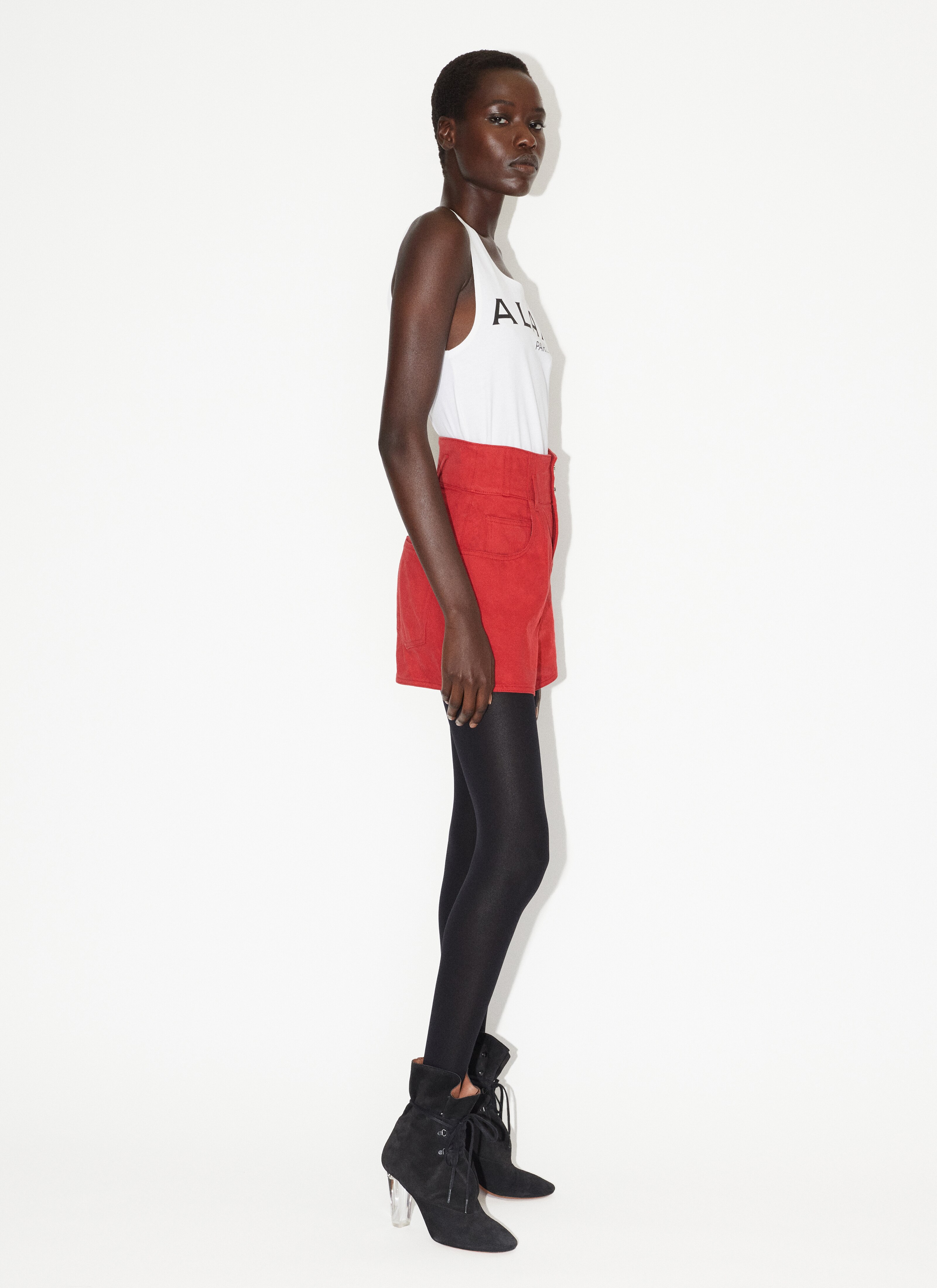 ALAÏA RED HIGH-WAIST DENIM SHORTS