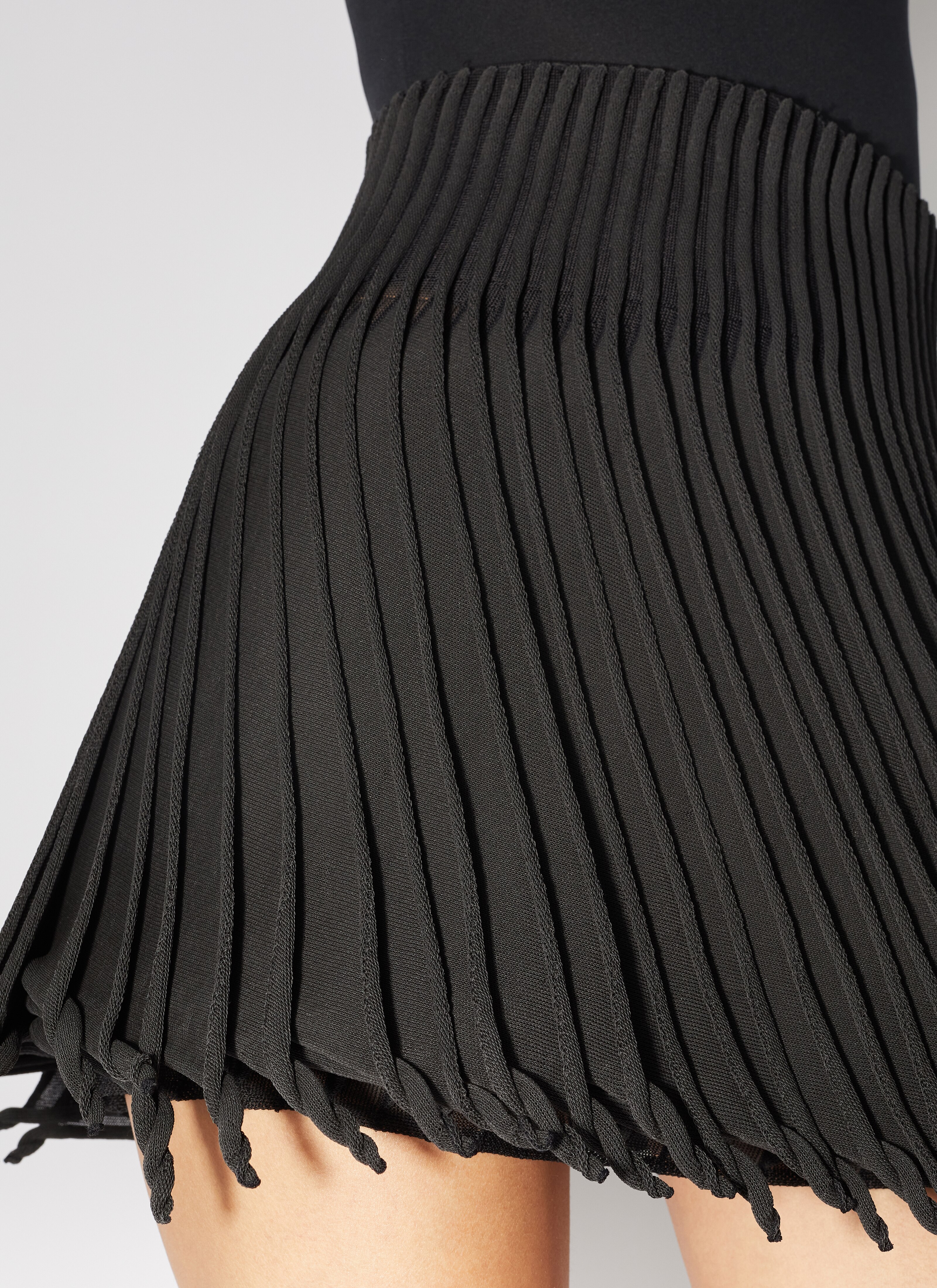 ALAÏA  PLEATED KNITTED SKIRT