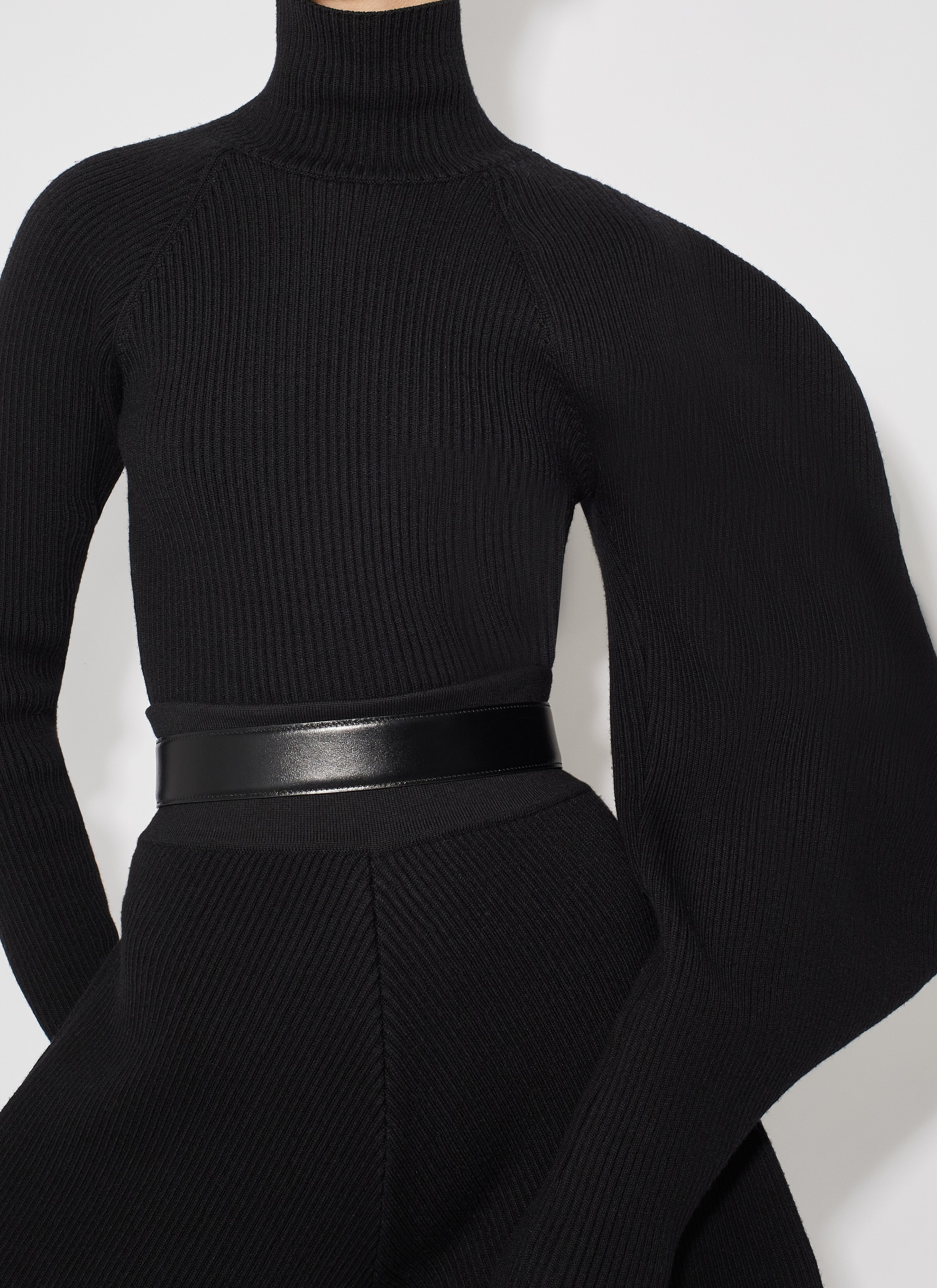 ALAÏA BLACK ASYMETRIC SCULPTURAL RIB KNIT SWEATER
