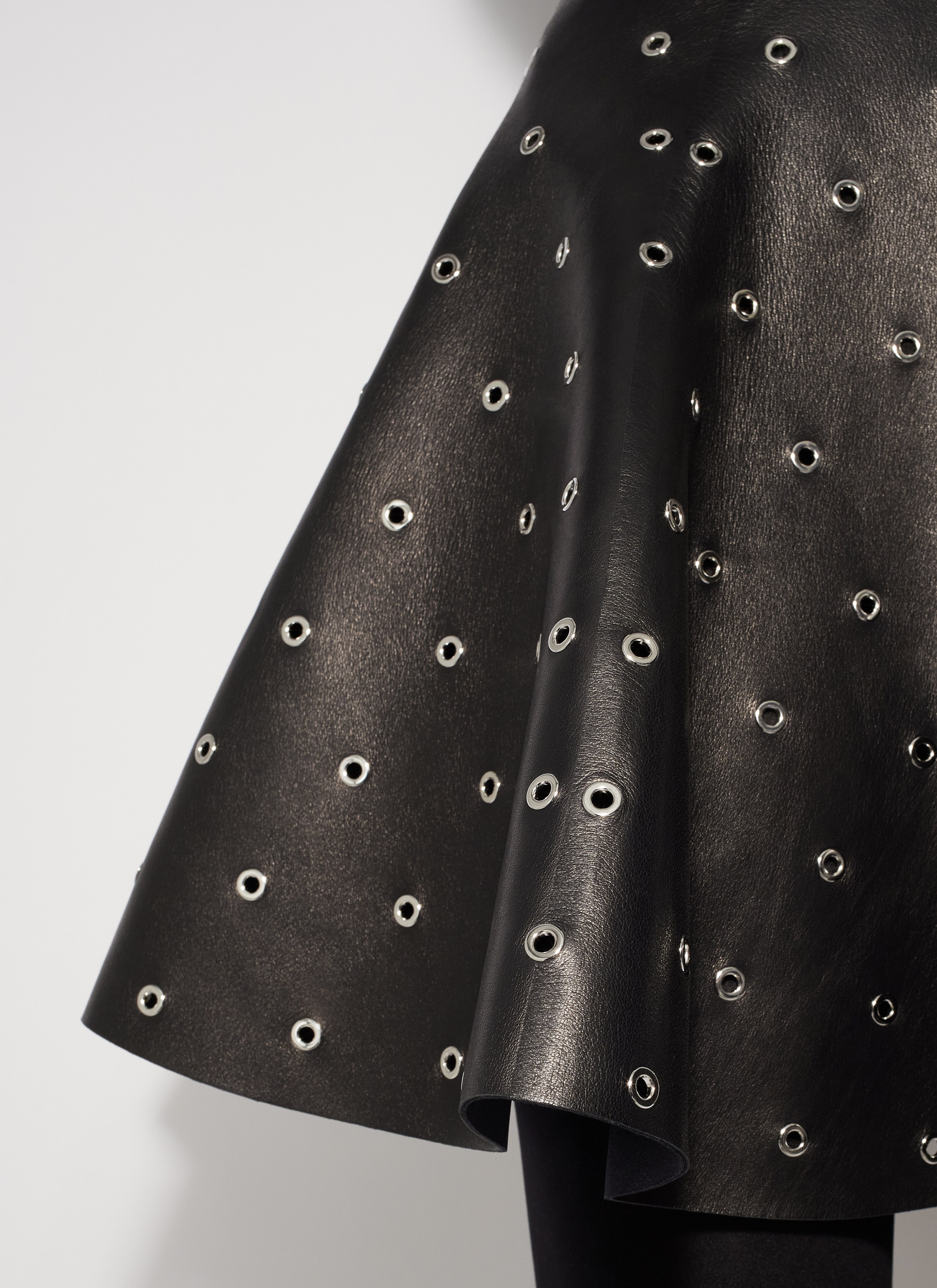 ALAÏA BLACK EYELET LEATHER SKATER SKIRT