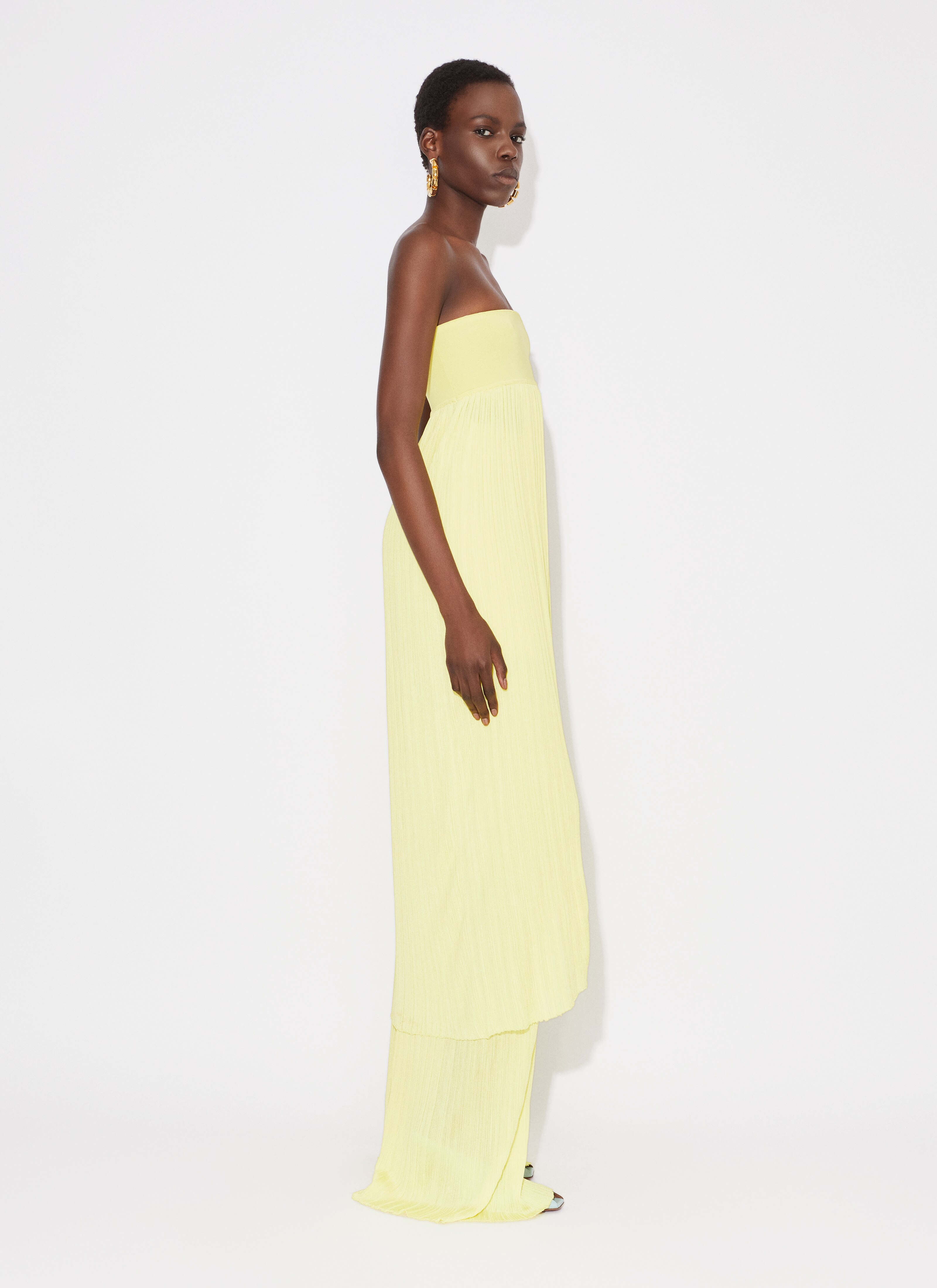 ALAÏA LIGHT YELLOW STRAPELESS DRESS IN PLEATED KNIT