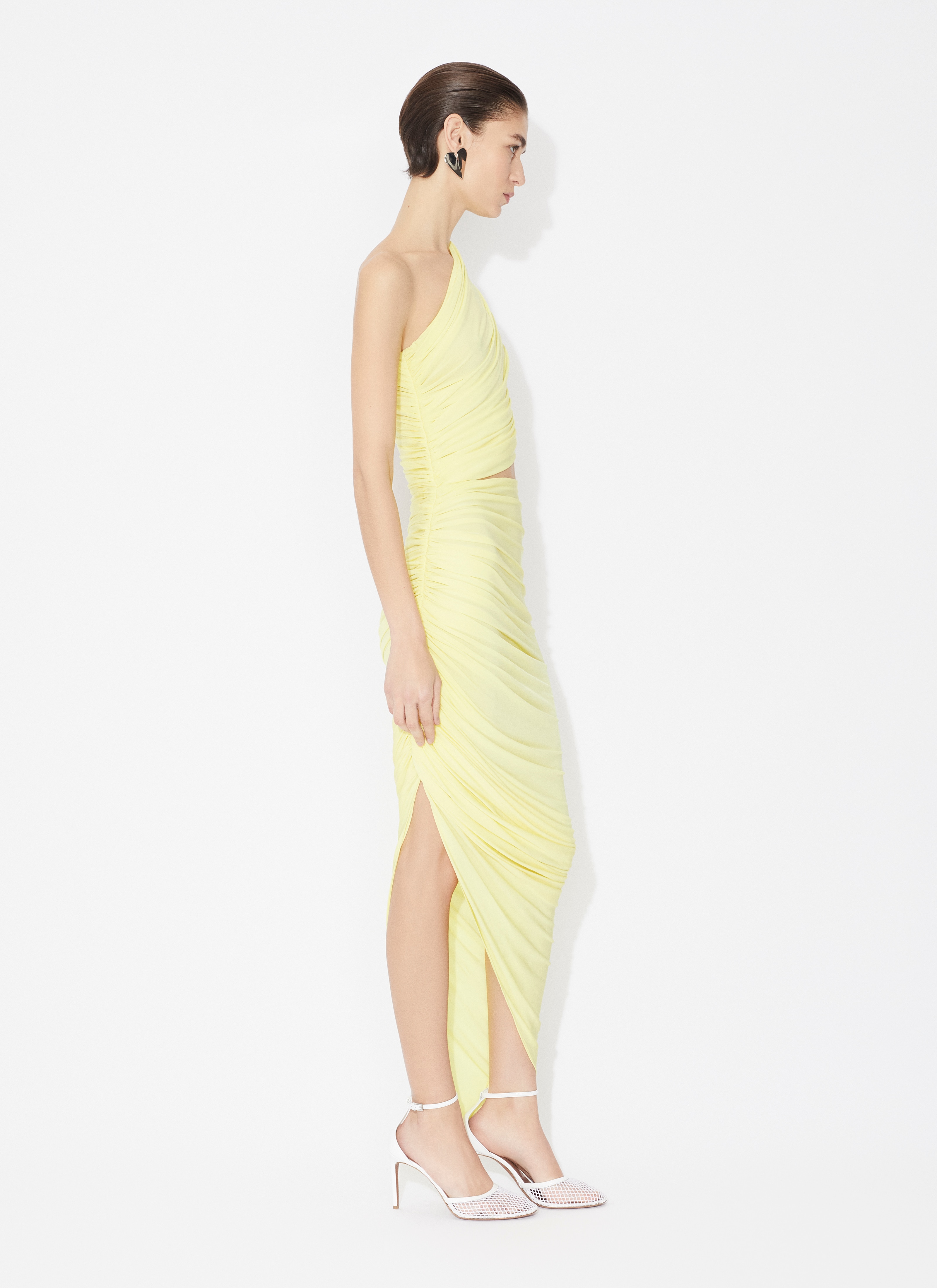 ALAÏA LIGHT YELLOW ASYMMETRICAL SECOND SKIN CUT-OUT DRESS