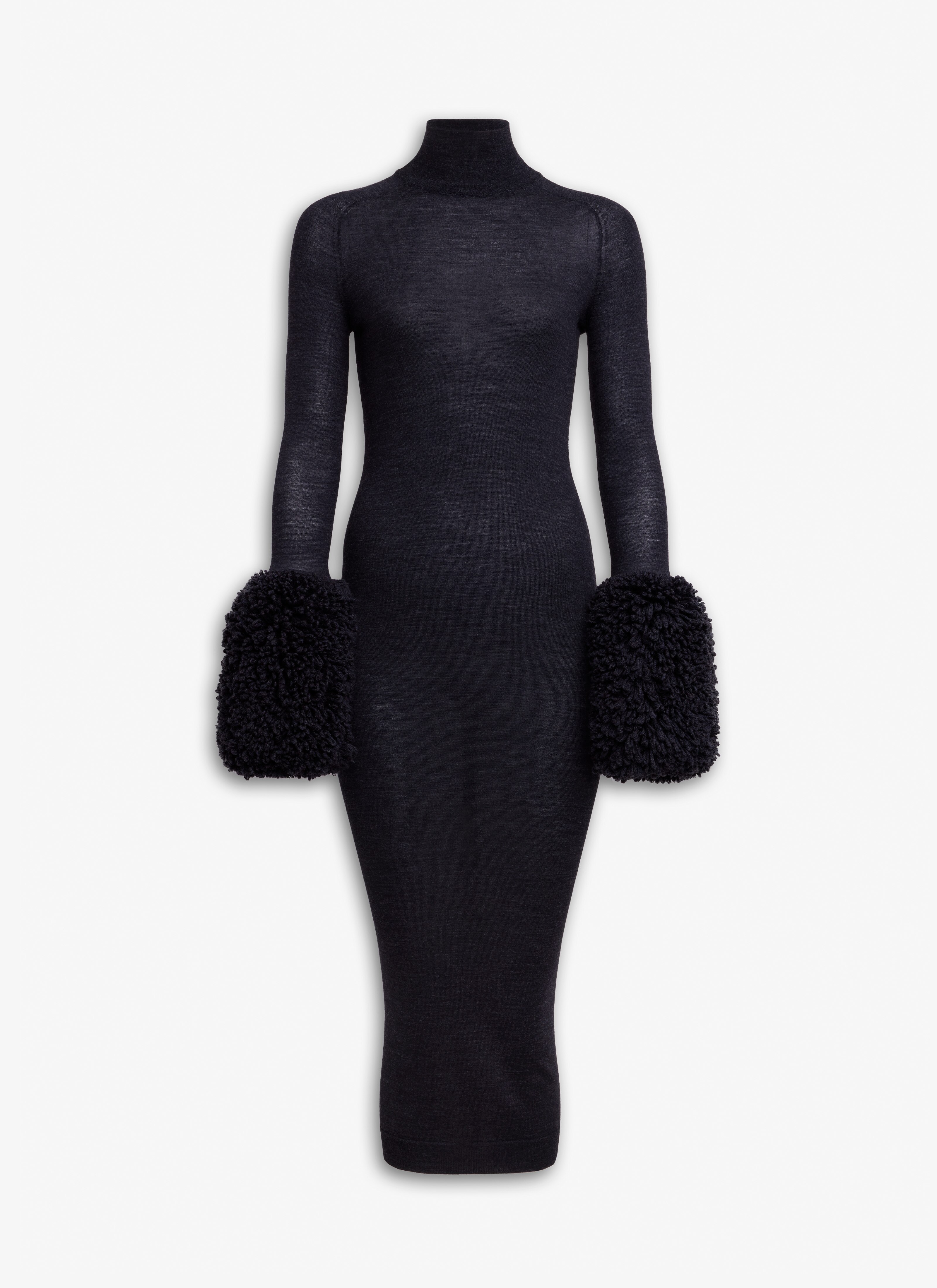 ALAÏA SCHWARZ FIGURBETONTES STRICKKLEID MIT POMPON-MANSCHETTEN