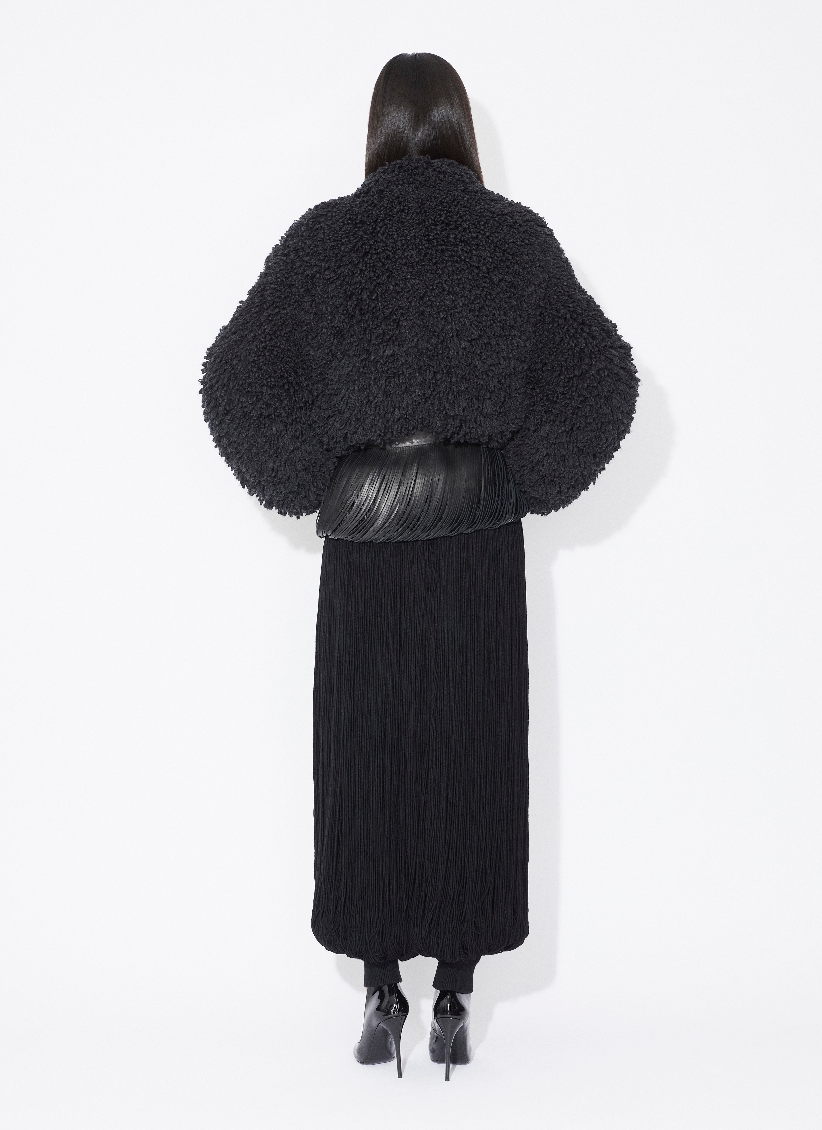 ALAÏA NERO PANTALONI ARROTONDATI IN MAGLIA CON FRANGE