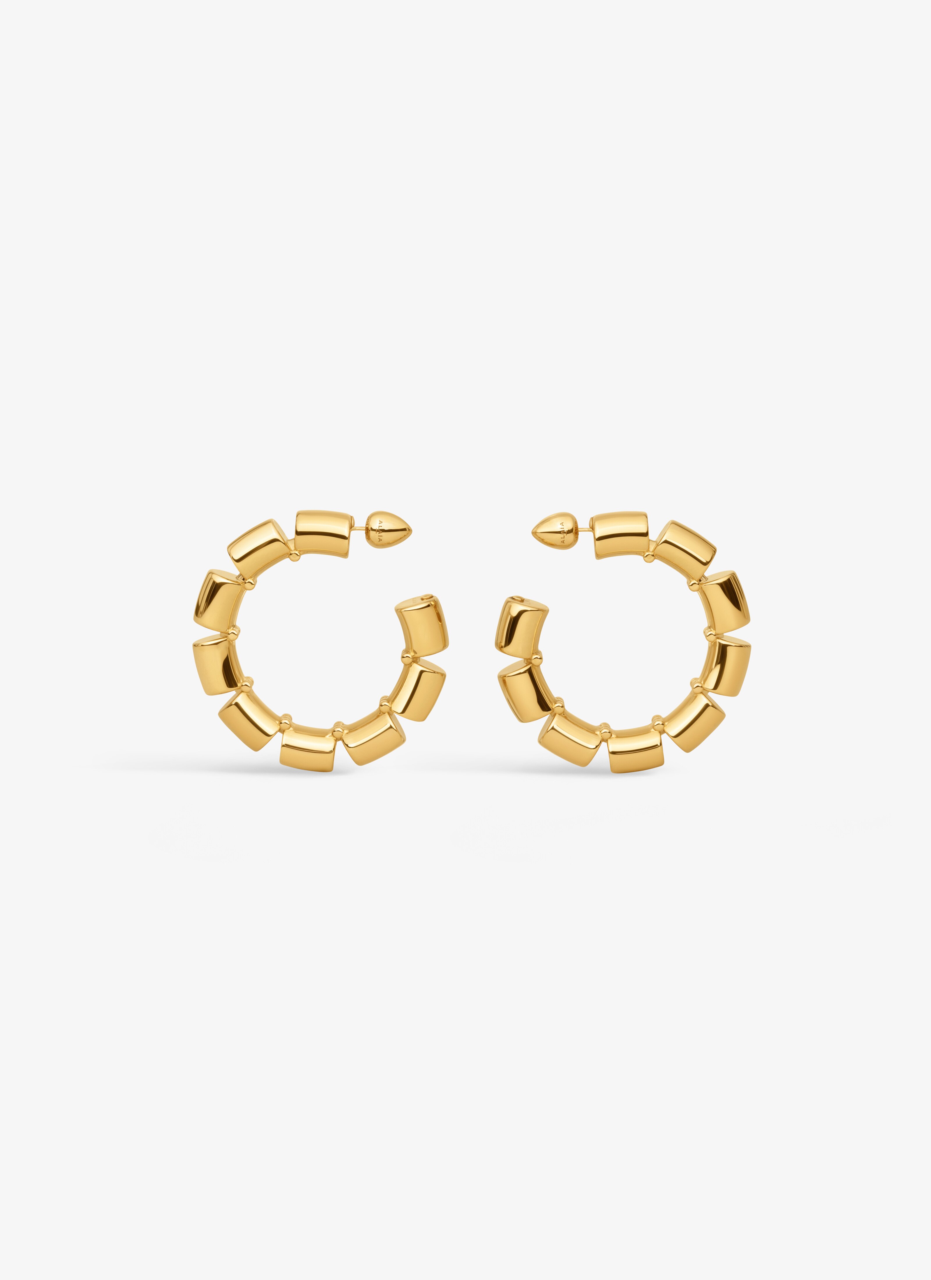 ALAÏA GOLD STACKING HOOP EARRINGS