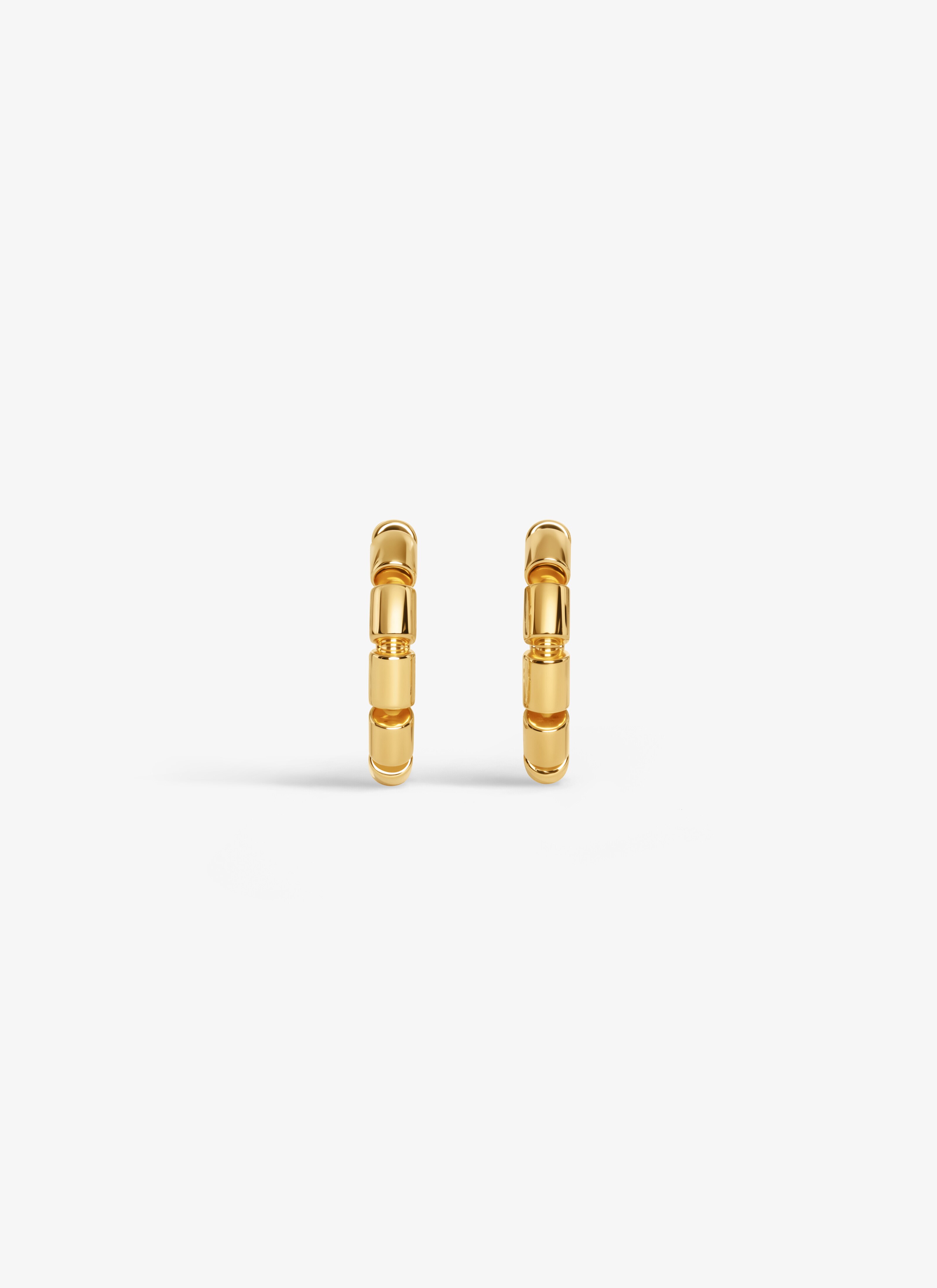 ALAÏA GOLD STACKING HOOP EARRINGS