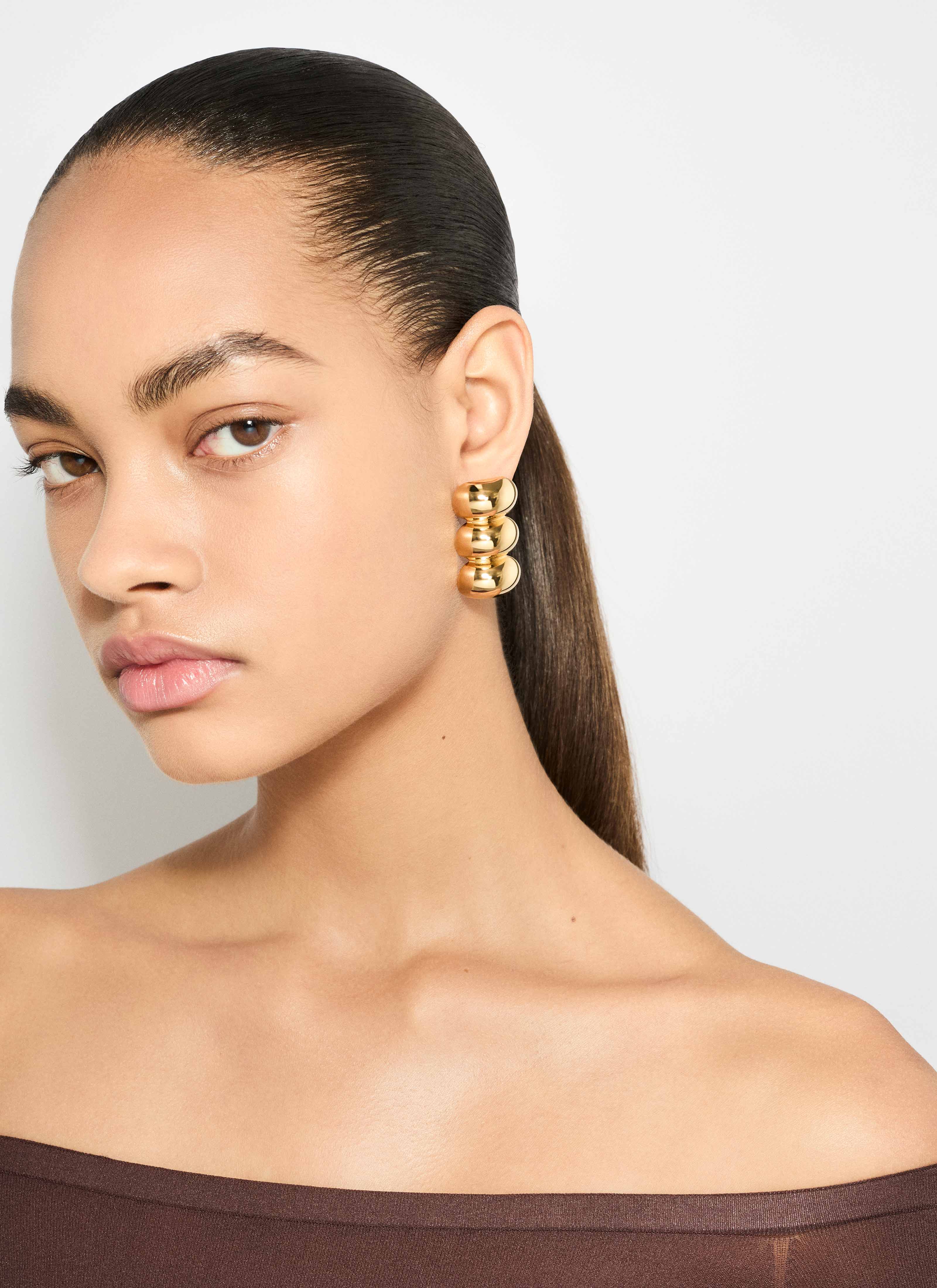 ALAÏA GOLD BUMPER EARRINGS