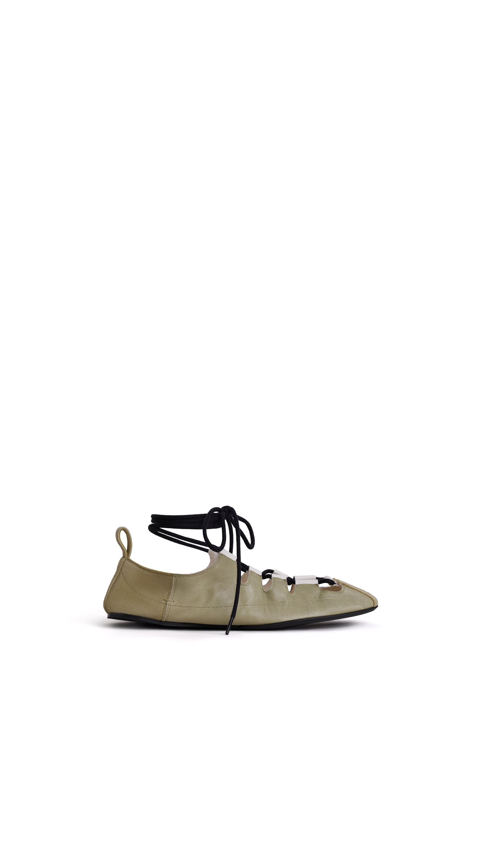 ALAÏA ALMOND GREEN FOLD LACED FLATS IN LEATHER | ALAÏA US