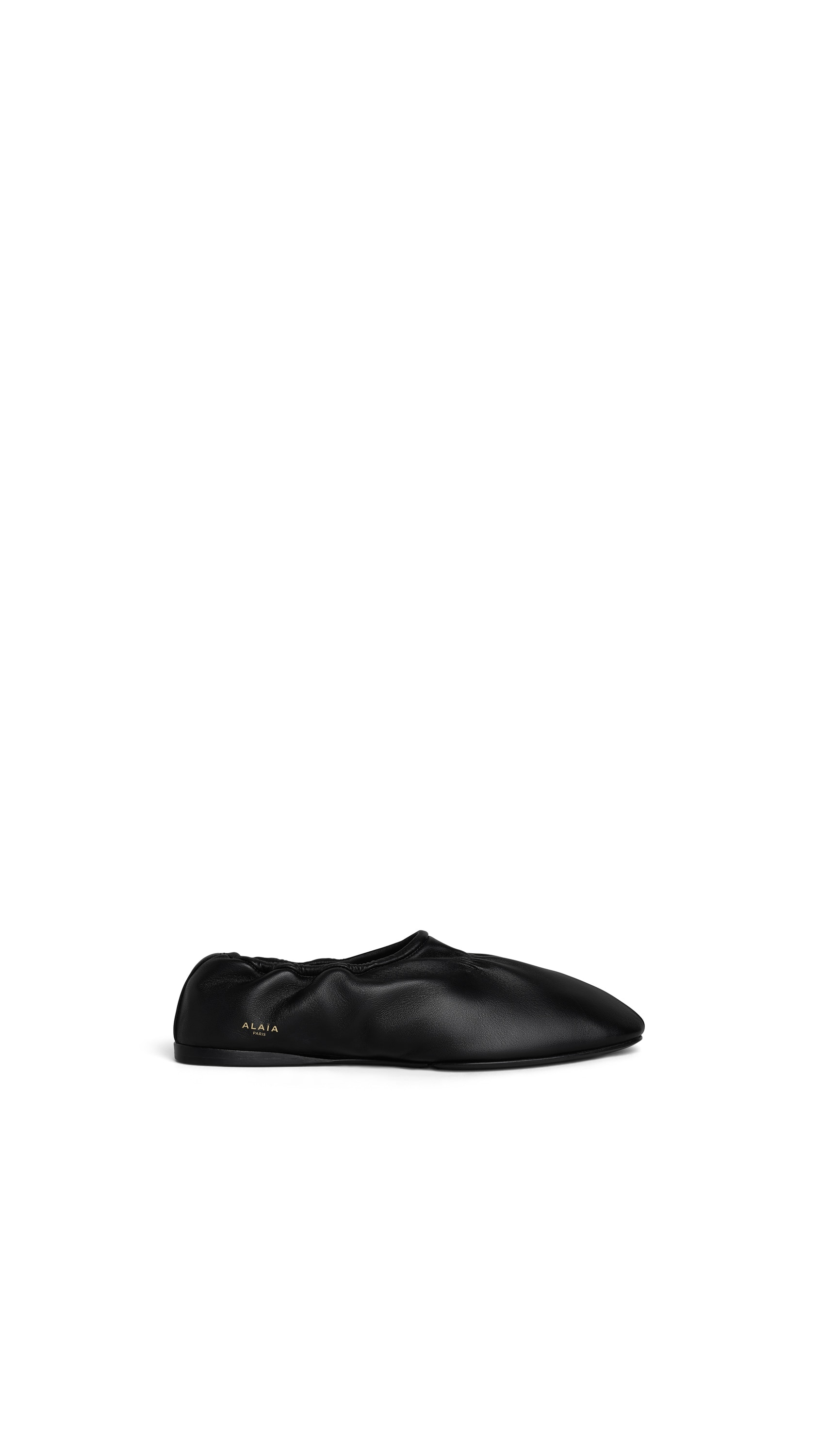 ALAÏA BLACK SUPPLE SLIPPERS IN LEATHER | ALAÏA US